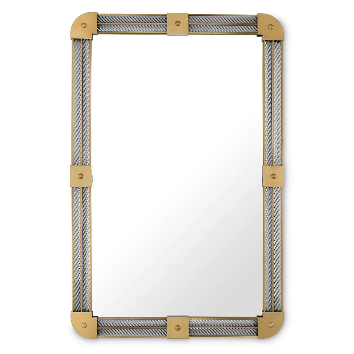 Mirror Gamay Brass with structure in solid brass in
vintage finish, with torsade glass rods insade the 
brass frame. With clear glass mirror.