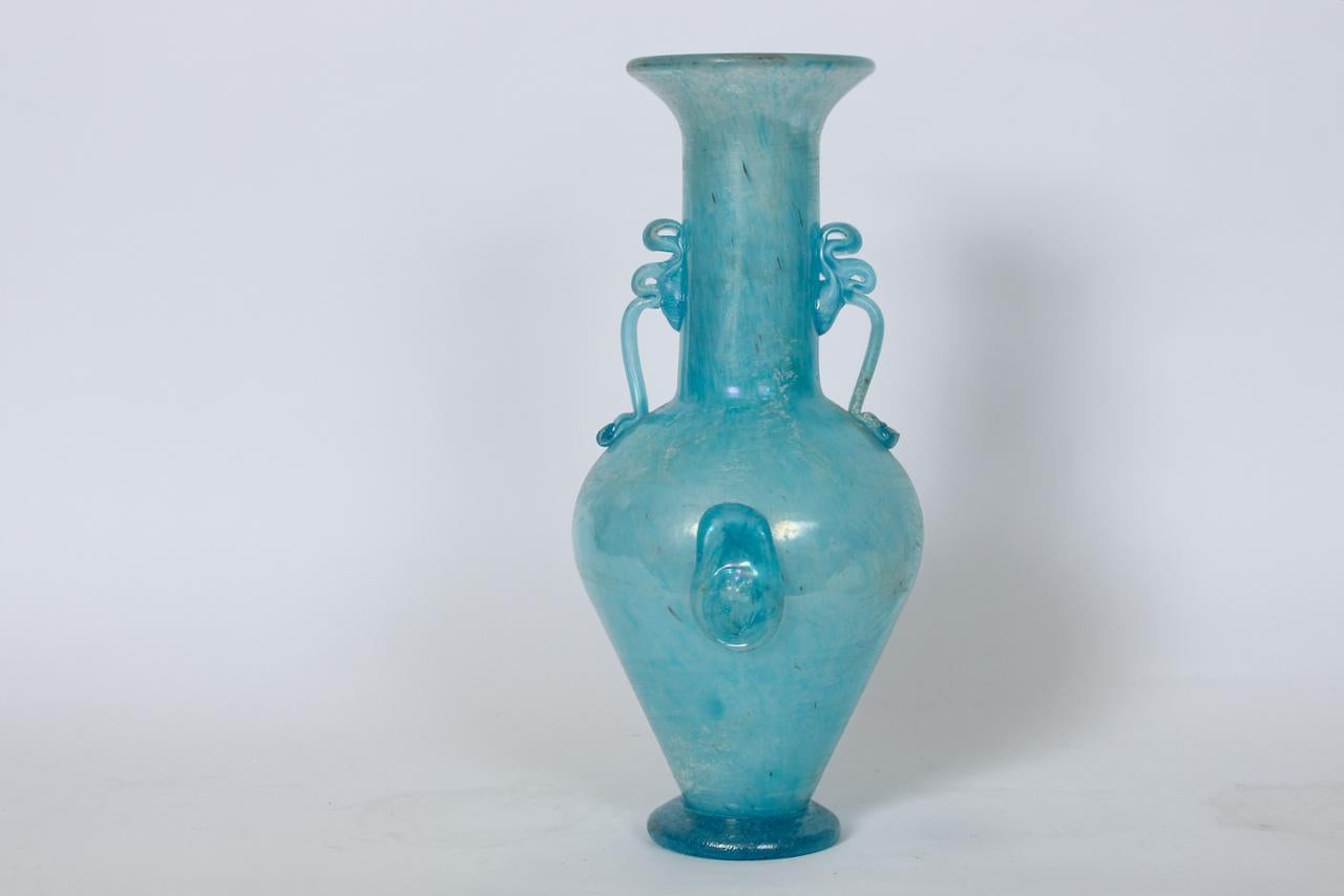 Frosted Aquamarine Gambaro and Poggi Scavo Murano Glass Vase, Circa 1990s. Featuring a handcrafted frosted Agean blue and green ancient Roman style glass form with two looped decorative handles and escutcheons. 4.75D opening. 4D round base. Classic.
