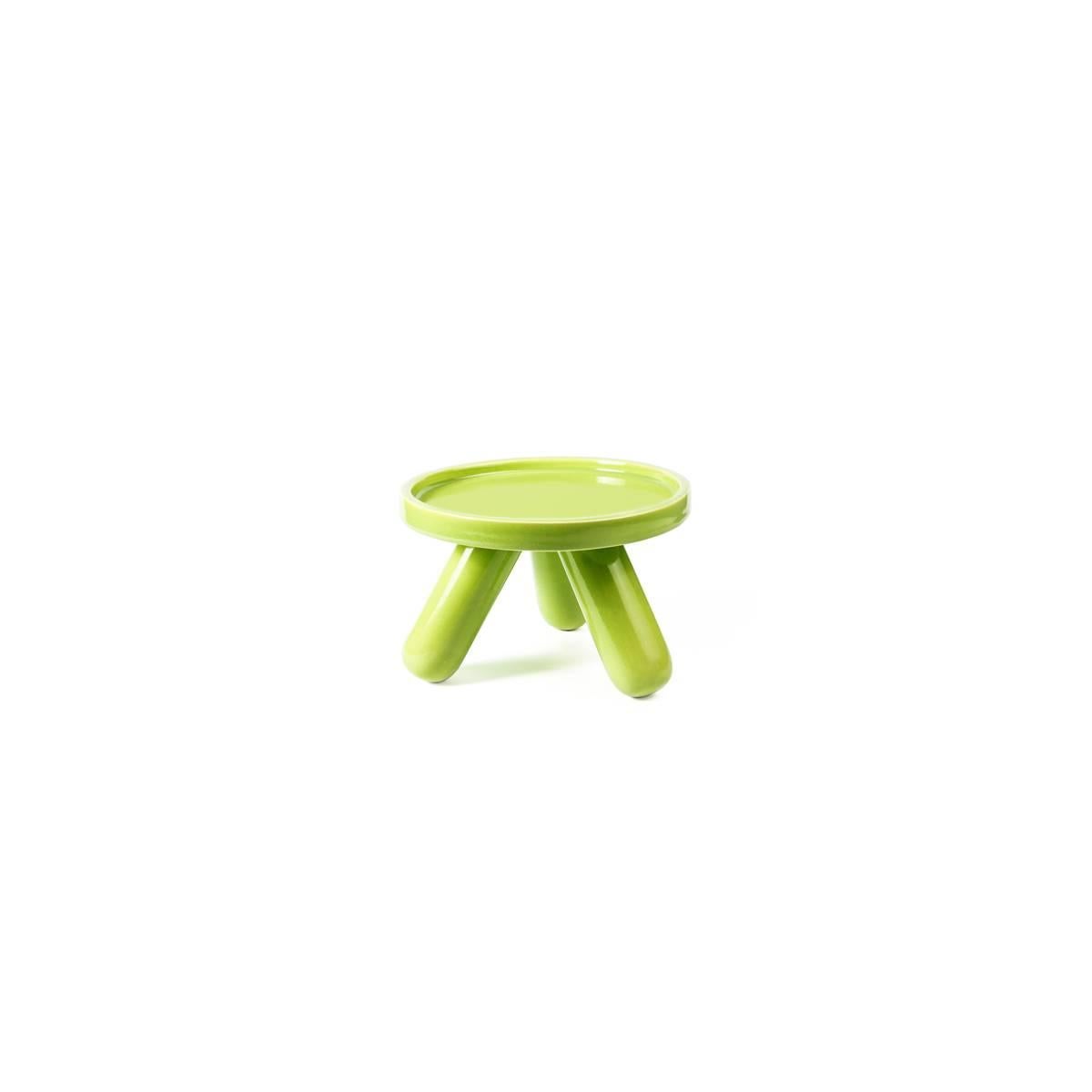 Gambino is a ceramic riser designed by Aldo Cibic, it is available in two color versions (red and green). The product is part of Table Joy Collection: an upbeat, vividly colored and ever so slightly radical family of tableware that can be