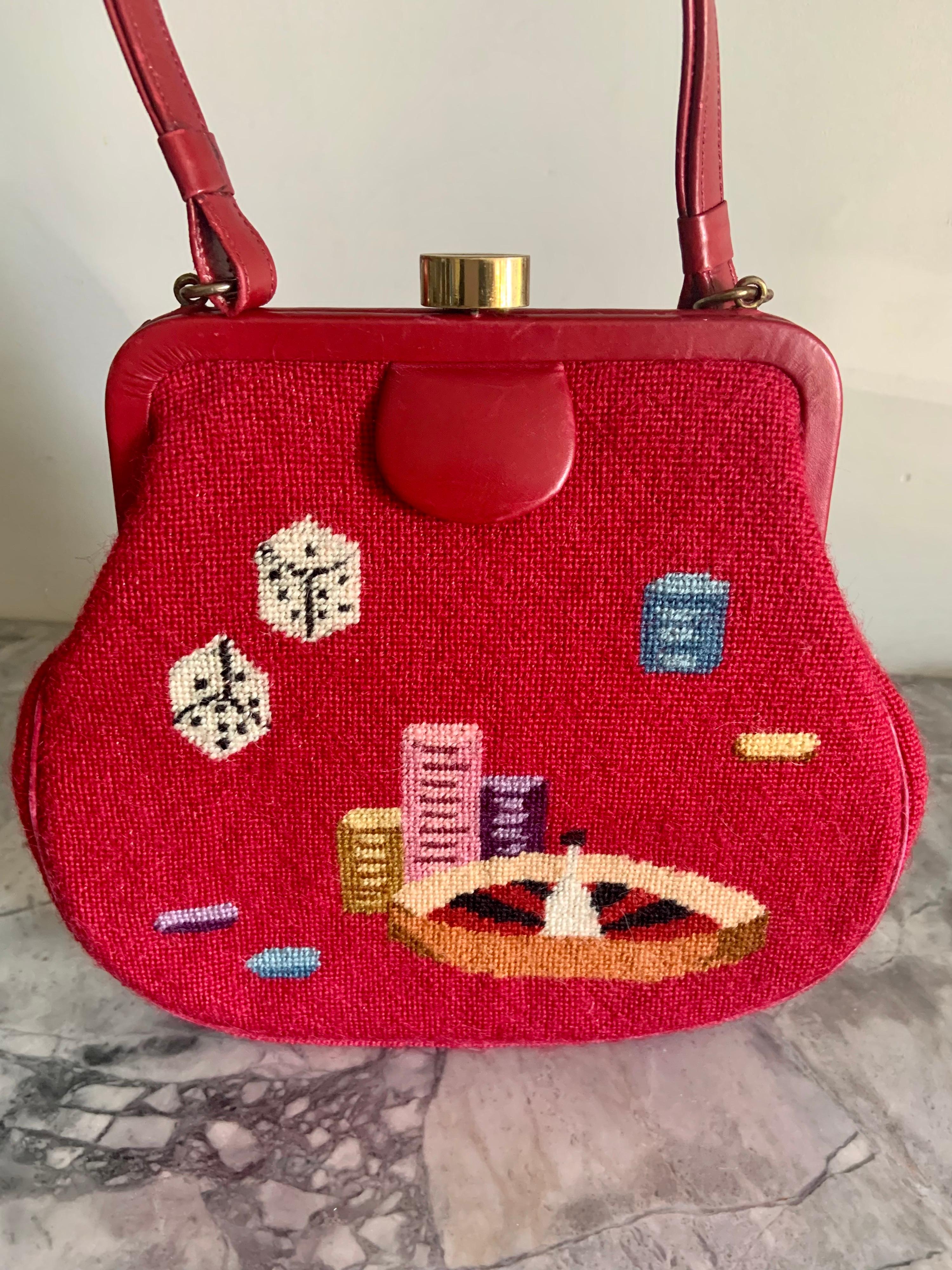 This tiny bag is perfect for the gambler!  It would look chic and be a fun accessory in Monte Carlo, Las Vegas, Atlantic City or at the local bingo game. This bag is a small version of the popular needlepoint bags from the 1950's.  It is trimmed in