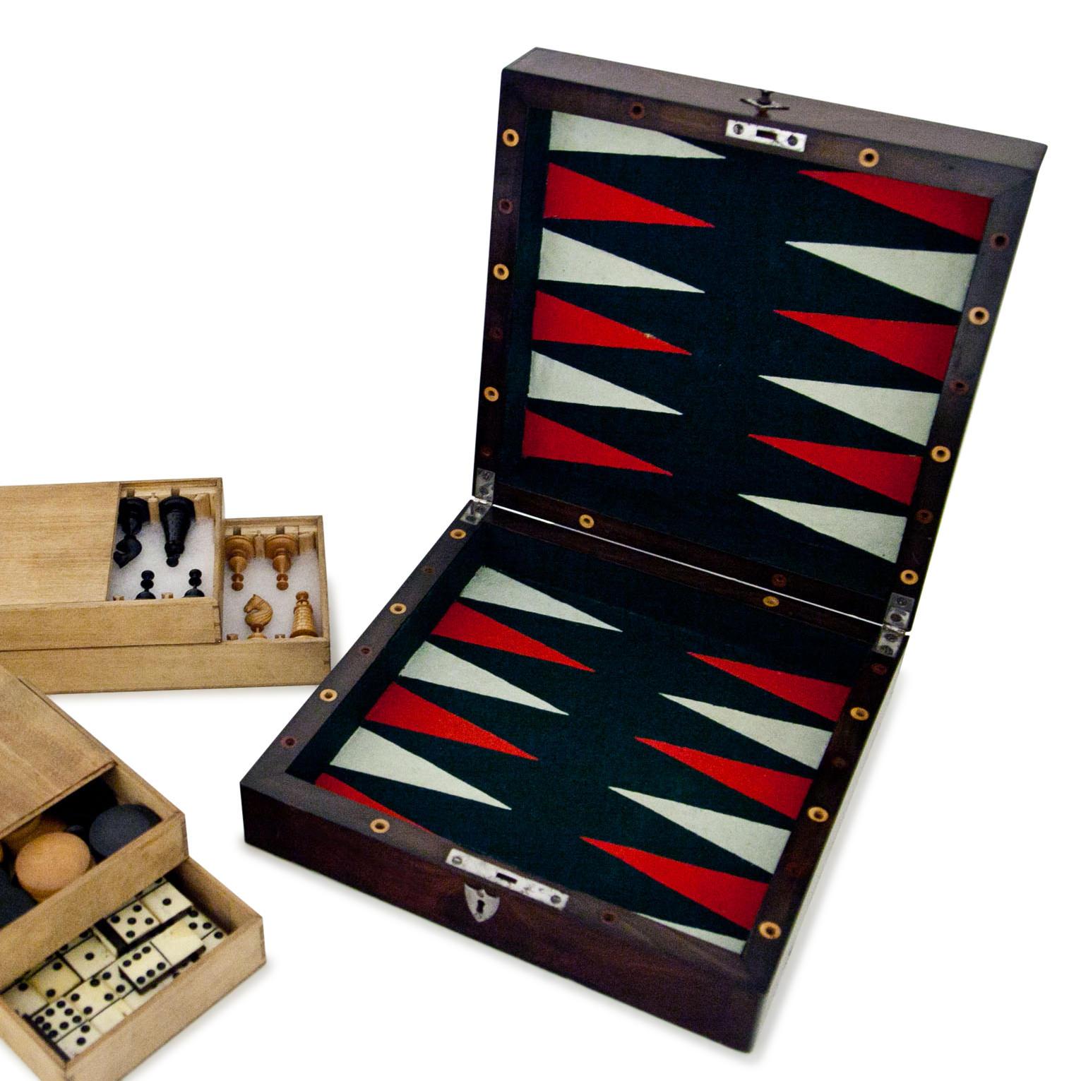Square game box for backgammon, Domino, chess and Nine men's morris from circa 1780-1800. The playing pieces are carved from maple and ebony, the box is mahogany, and the boards are inlayed with maple and ebony as well.


Dimensions unfolded