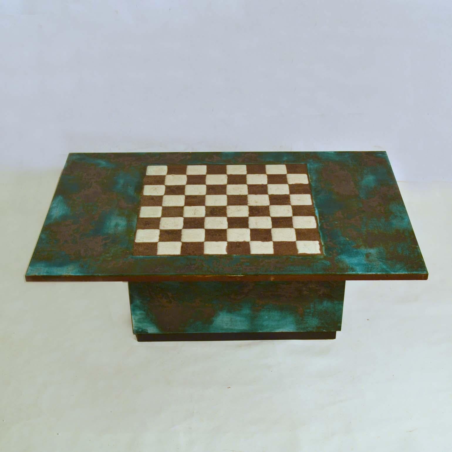 Unique 1960s hand sculpted chess table and coffee table is sculptural and yet functional, made out of large ceramic slabs and glazed in function of the game. The table exudes a Material richness and graphic simplicity. The black sections are not