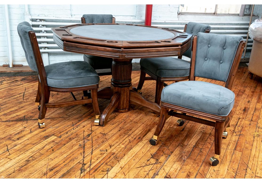 Very well made Games Table with good weight and comfort by respected American manufacturer Mikail Darafeev. Along with four comfortable dark stained wood chairs in matching faux gray-blue faux suede with button tufted backs. Ribbed seat rails and