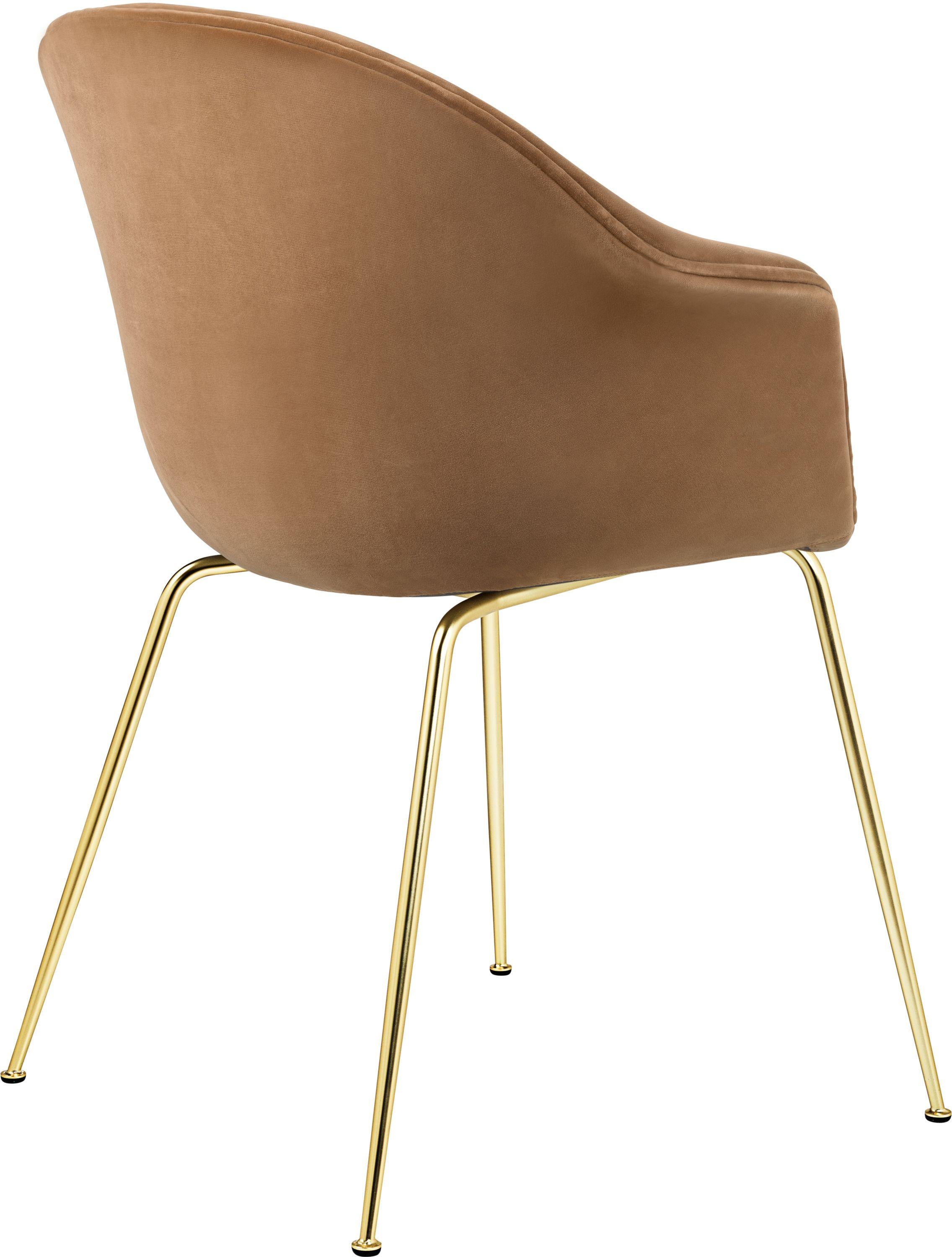 GamFratesi 'Bat' dining chair in light brown with semi matt brass conic base. Designed by Danish-Italian design-duo GamFratesi in 2018, the Bat dining chair is created with a Scandinavian approach to crafts, simplicity, and functionalism. Executed