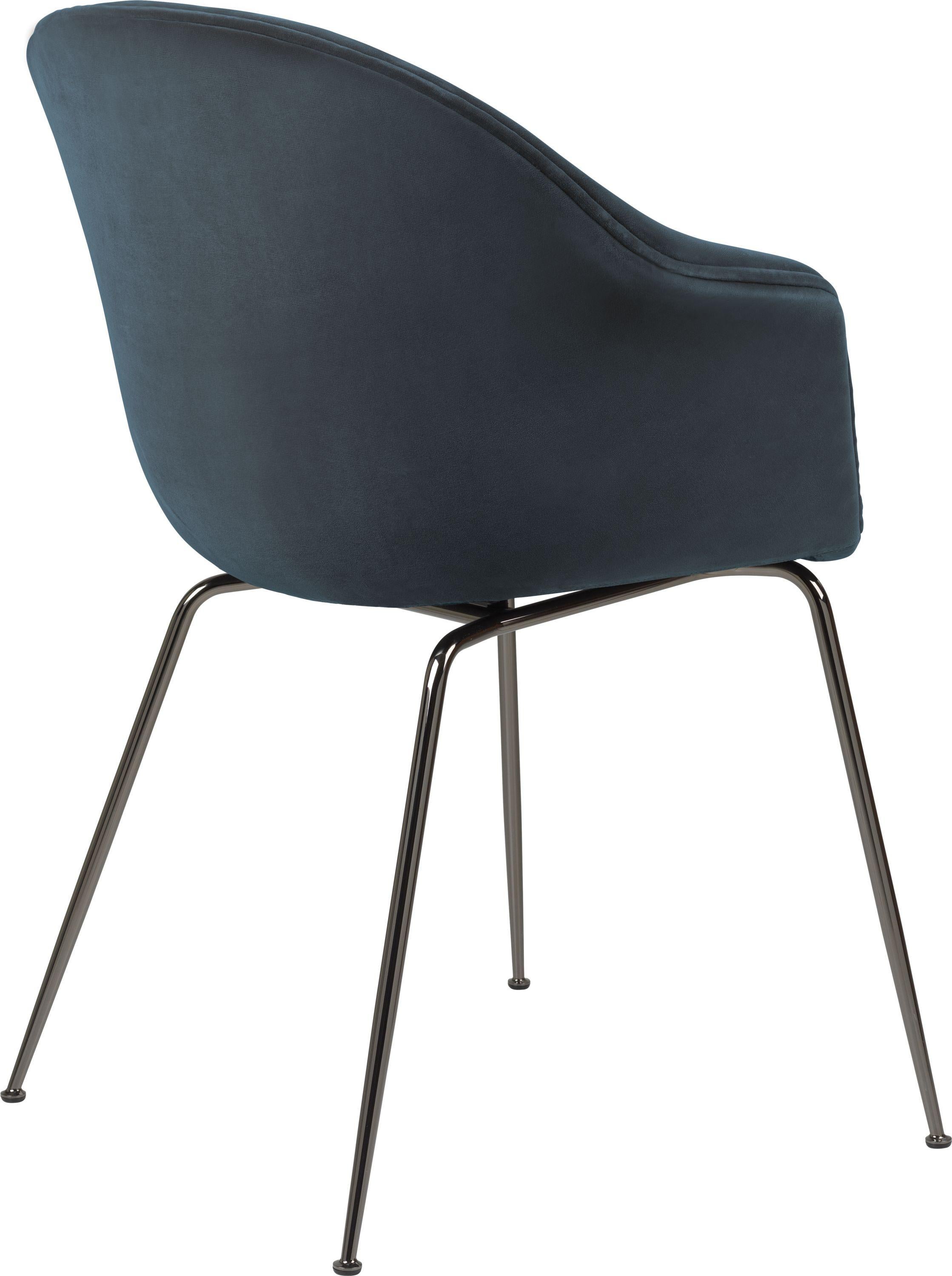 GamFratesi 'Bat' dining chair in navy with black chrome conic base. Designed by Danish-Italian design-duo GamFratesi in 2018, the Bat dining chair is created with a Scandinavian approach to crafts, simplicity, and functionalism. Executed in metal