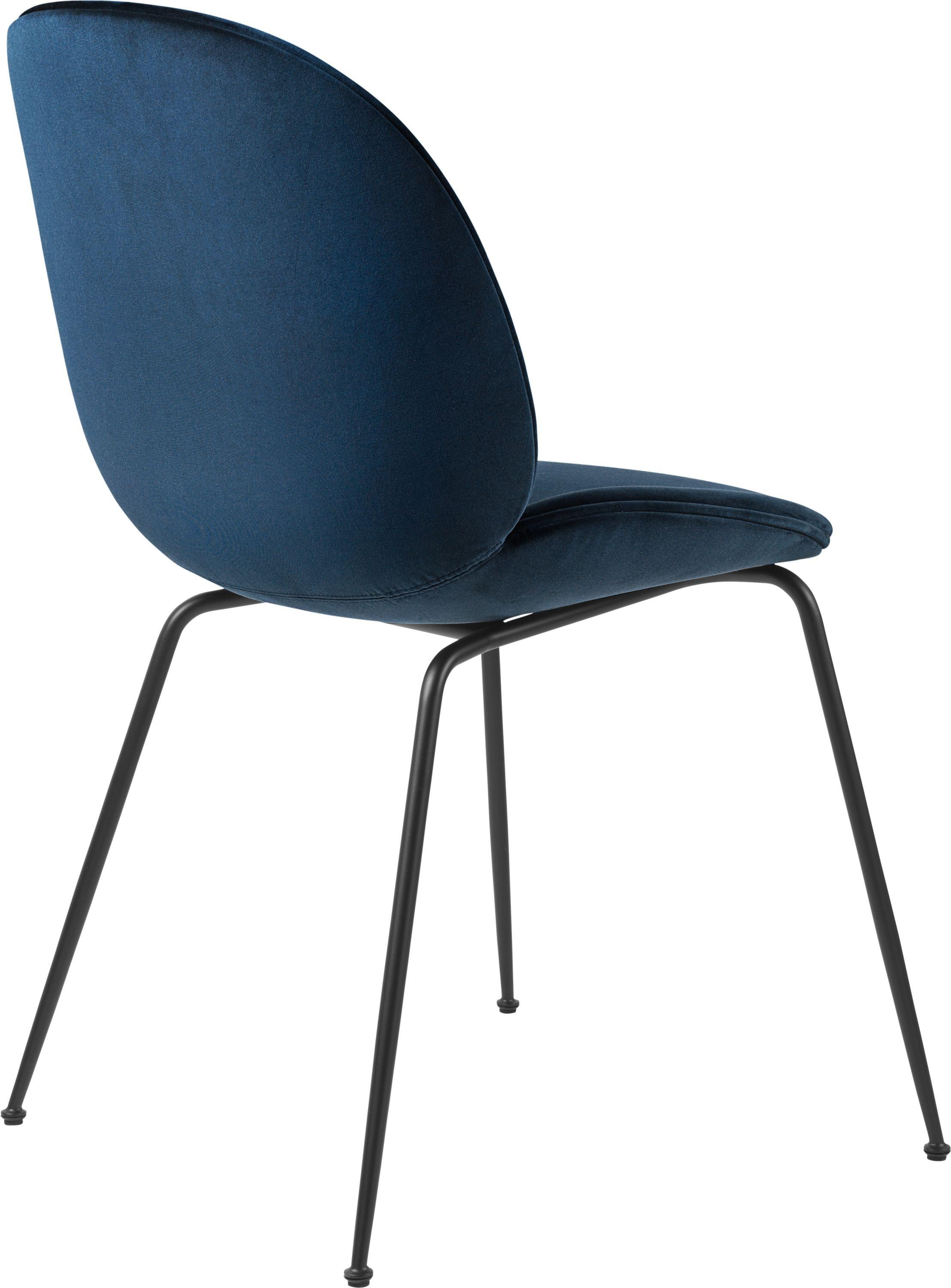 GamFratesi 'Beetle' dining chair in blue with conic base. Designed by Danish-Italian design-duo GamFratesi in 2013. Due to its appealing design, outstanding comfort, and unique customization possibilities, the dining chair has found a home in some