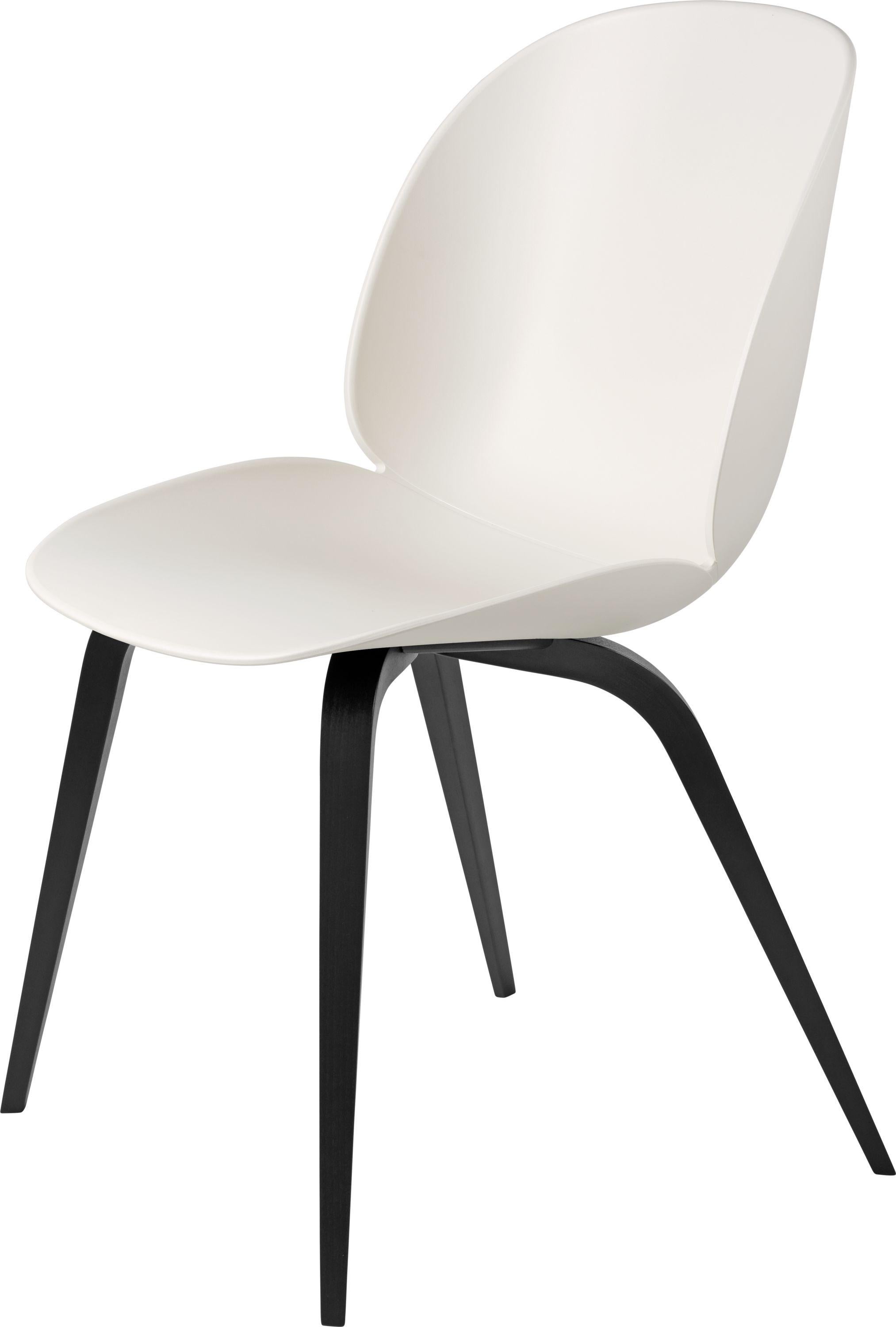 GamFratesi 'Beetle' dining chair with black stained beech conic base. Designed by Danish-Italian design-duo GamFratesi in 2013. The Beetle Chair’s durable outer shell is a continuous curved form reminiscent of the strong and graceful contours of the