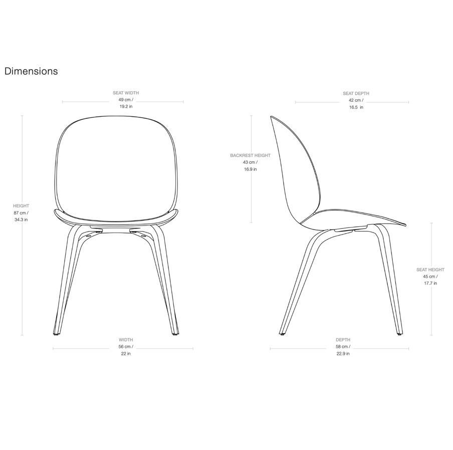 GamFratesi 'Beetle' dining chair with oak conic base. Designed by Danish-Italian design-duo GamFratesi in 2013. The Beetle Chair’s durable outer shell is a continuous curved form reminiscent of the strong and graceful contours of the insect that