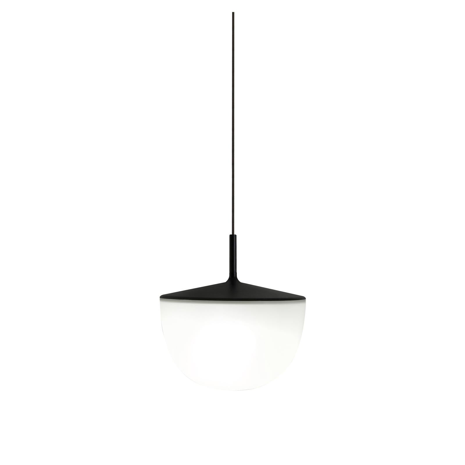 Designed by GamFratesi in 2013 and manufactured by Fontana Arte, the Cheshire suspension lamp echoes the studio’s Nordic imprint in its simplicity and functional aspects. The opaline polycarbonate diffuser ensures soft lighting, while the colored