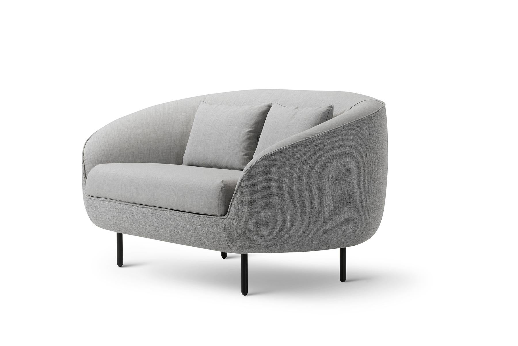 Gamfratesi The Haiku Low 2-Seater sofa offers both a protective shell and cosy inner setting. Perfectly suited for larger spaces where the setting calls for more intimate privacy seating.