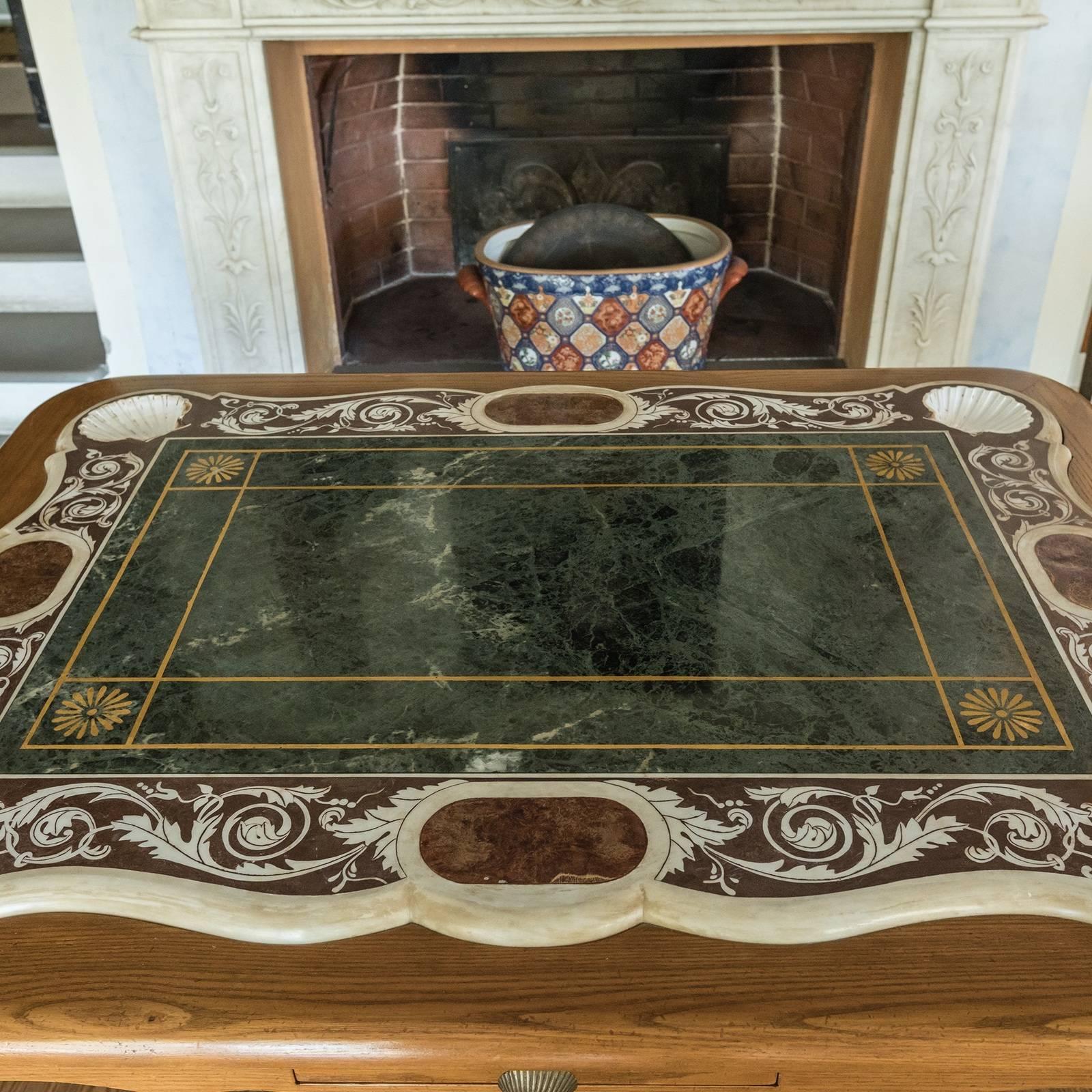 A superb addition to a Classic or eclectic home, this table is designed to accompany evenings playing cards and entertaining in style. Resting on four Baroque-inspired legs that elegantly curve to meet the rectangular top, the standout feature of