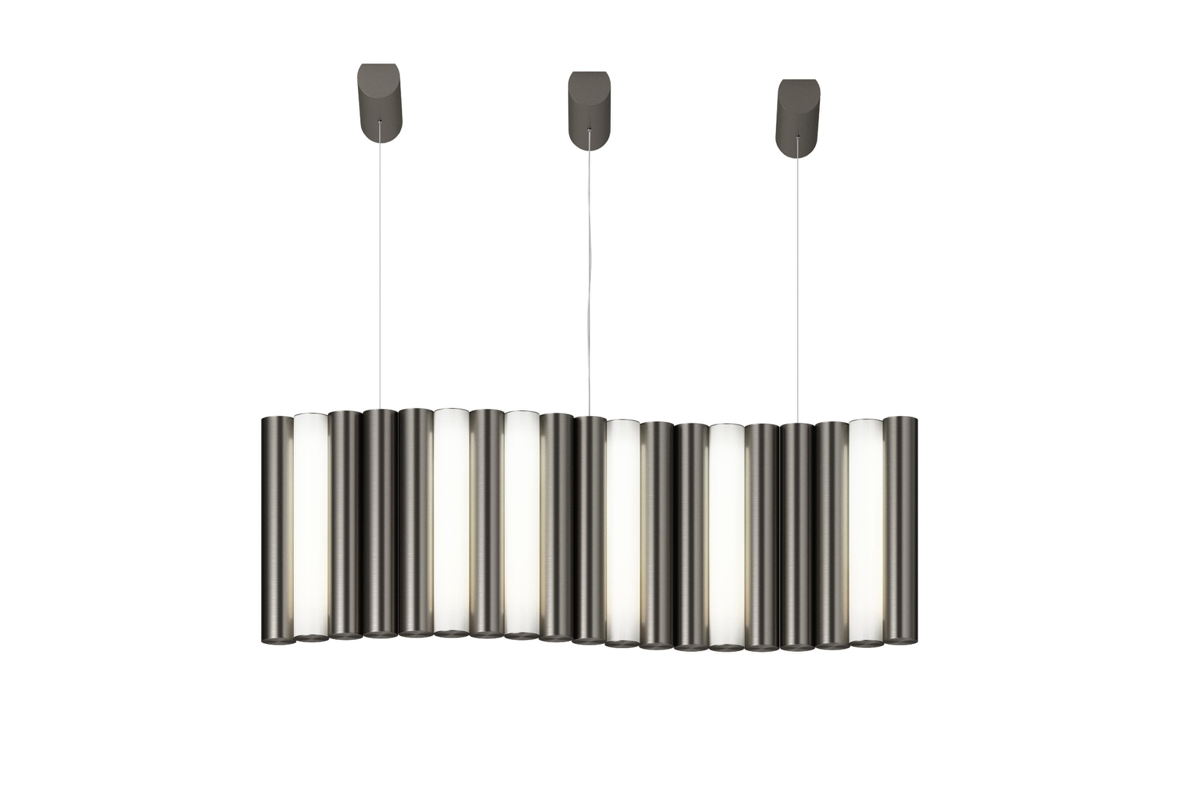 Gamma L19 graphite pendant by Sylvain Willenz
Dimensions: D96 x W41.5 X H36.3 cm
Materials: solid brass, white Polycarbonate diffuser, metal cable and transparent electric cable.
Others finishes and dimensions are available.

All our lamps can