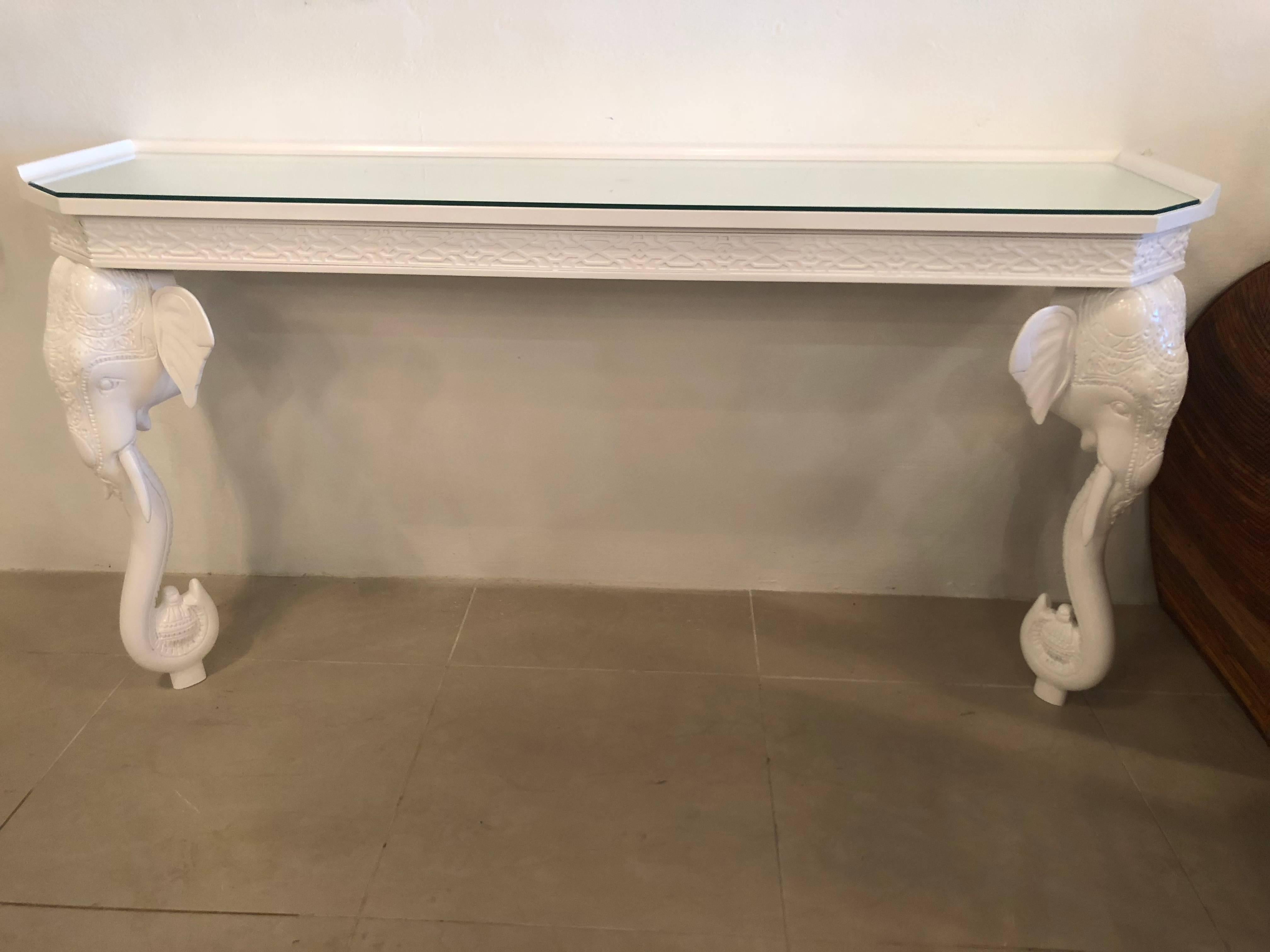 Vintage Gampel & Stoll elephant wall console table. This mounts to the wall. This has been professionally lacquered in a white gloss. This has a removable glass top. Fret work details.