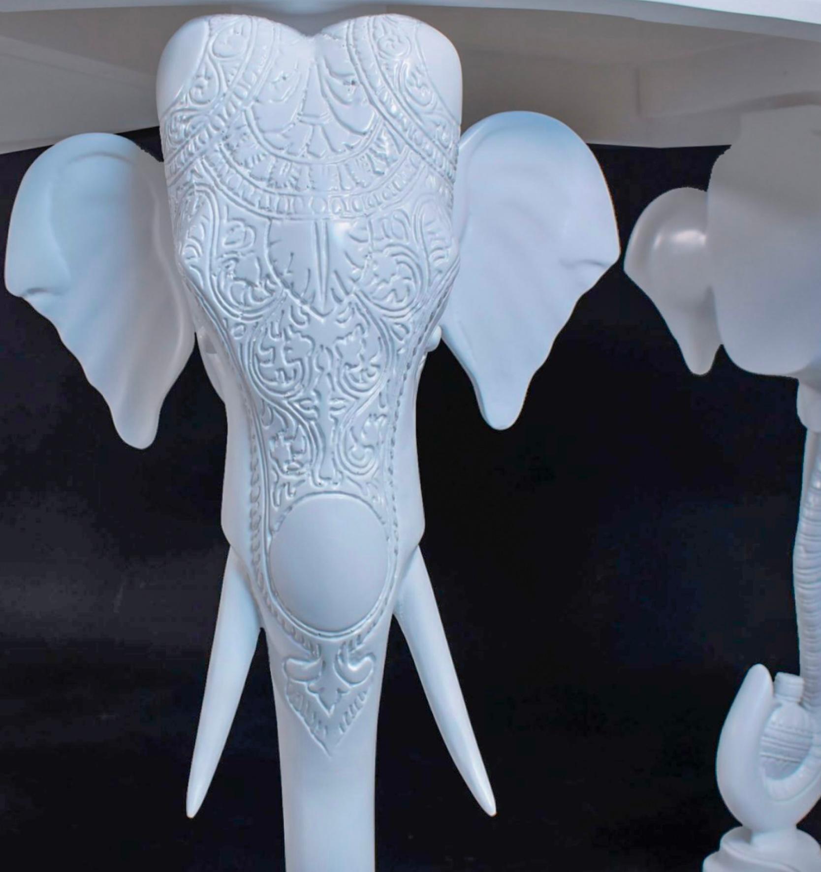 This is an elephant from Chinese Chippendale style desk by Gampel-Stoll. It has a single drawer and is a white satin. The demilune frame is trimmed in chippendale fretwork. It is one of the iconic Gampel-Stoll pieces.
