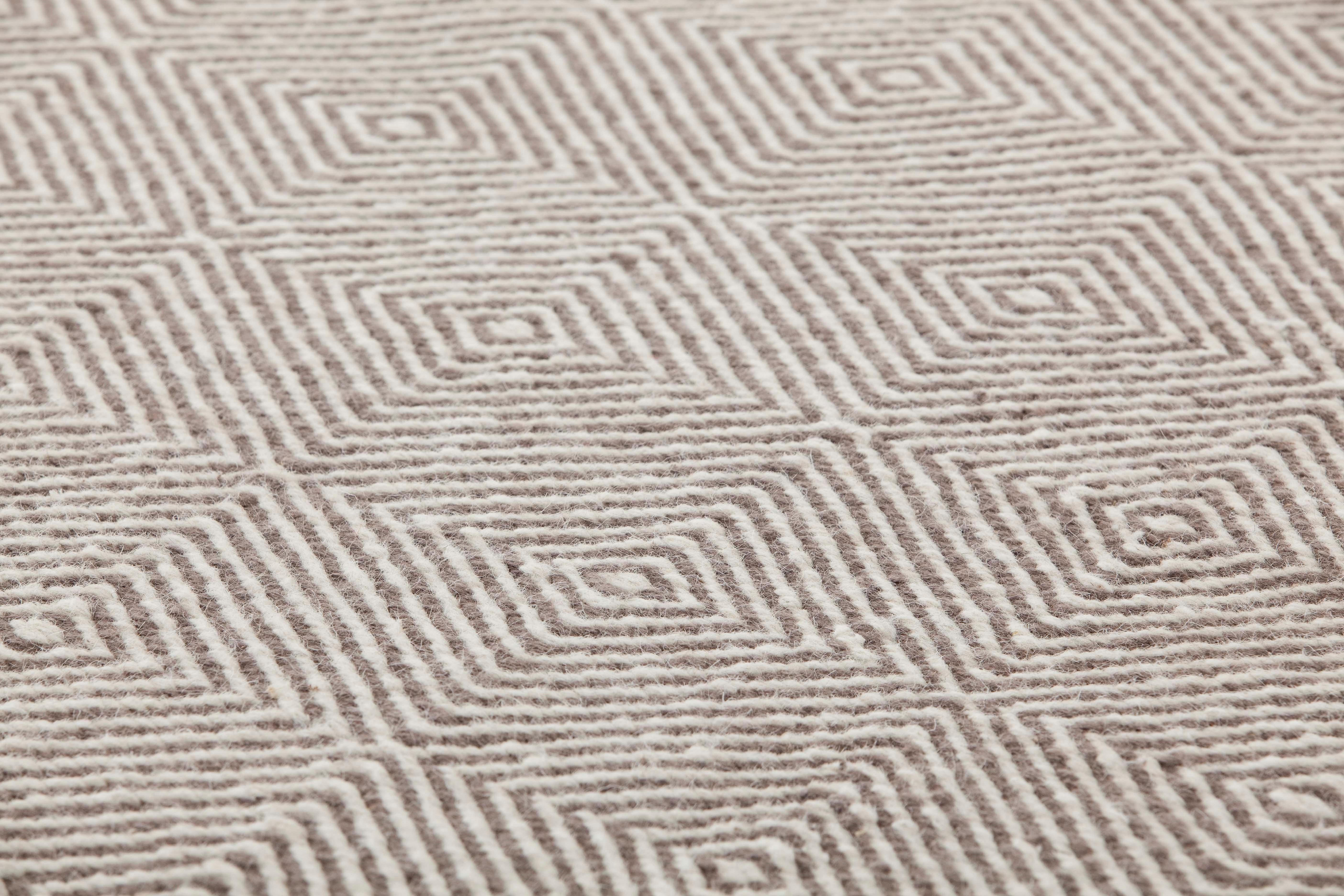 Dhurrie wool is transformed and grows in volume. Urban, sober and essential, it reveals myriad new possibilities. 

Additional information:
Material: Jute. 100% wool. Reversible
Color: Taupe
Technique: Dhurrie
Dimensions: 79 W x 118 D x 0.39 H