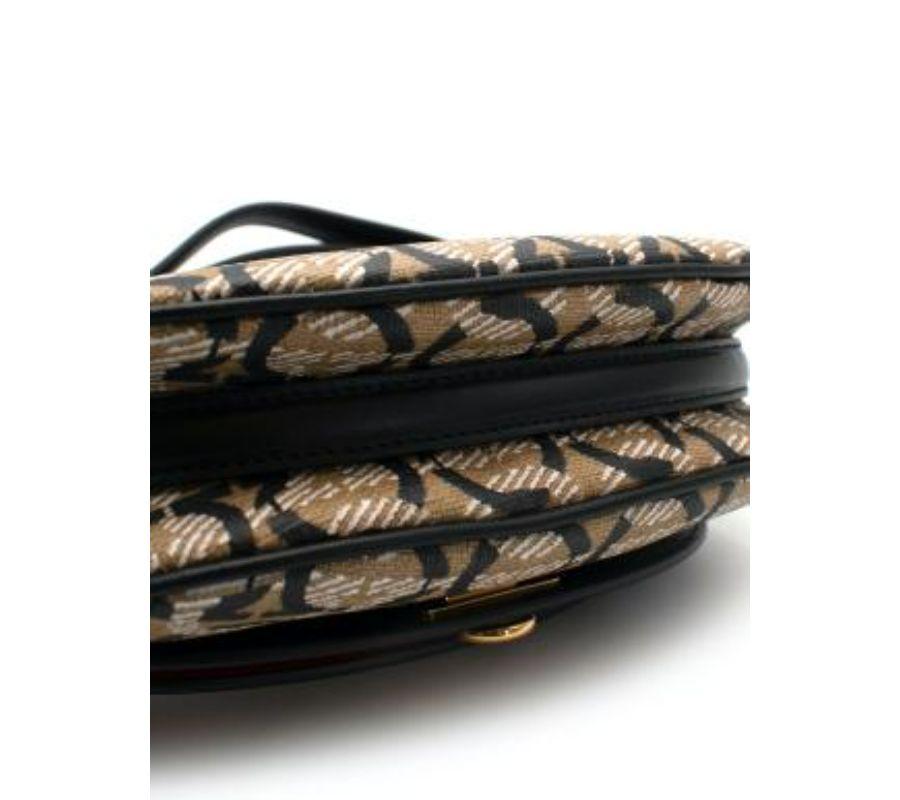 Salvatore Ferragamo Gancini Print Canvas Saddle Bag For Sale 1