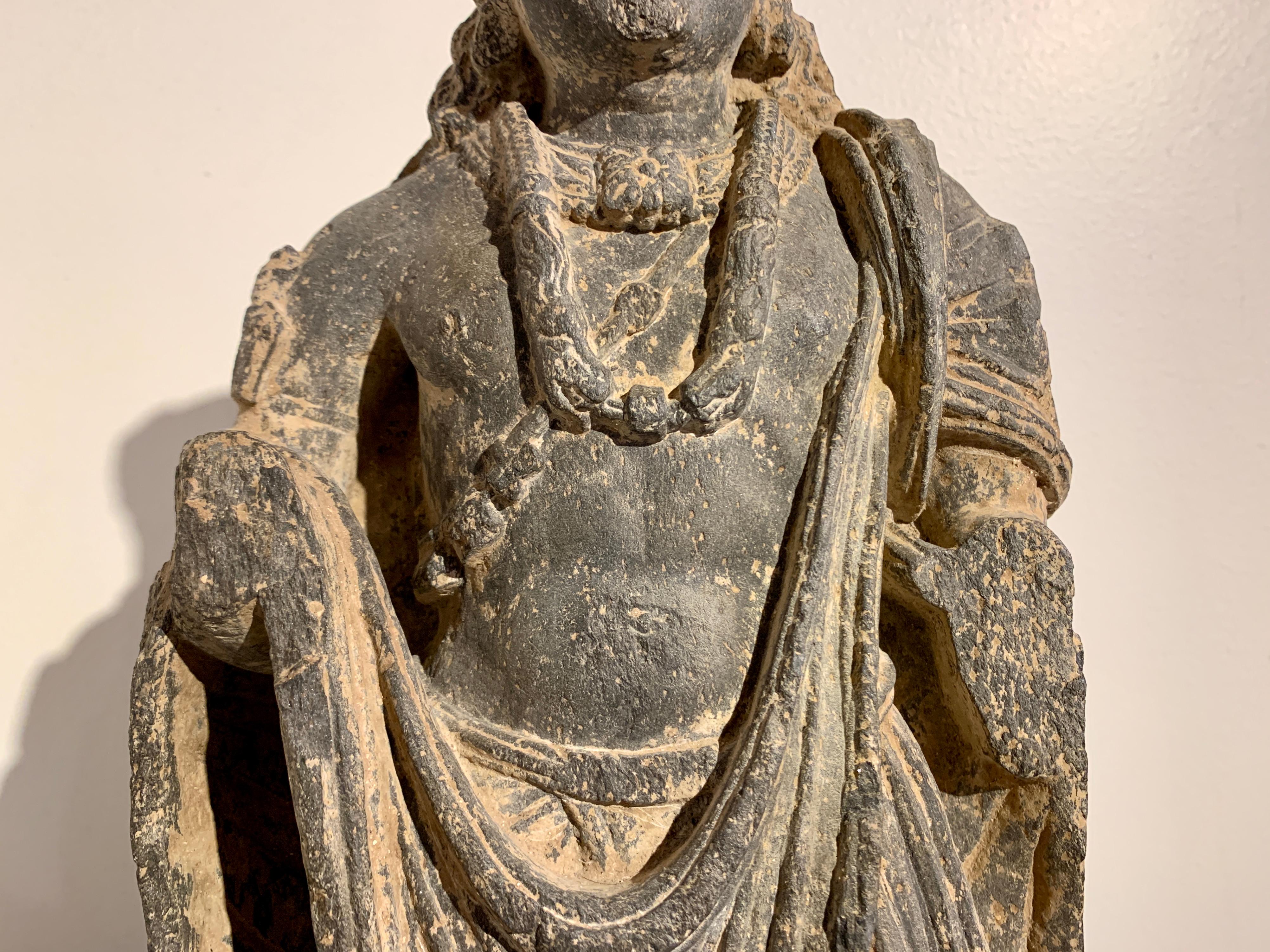 Gandharan Standing Bodhisattva Maitreya, Carved Black Schist, 2nd-4th Century In Fair Condition For Sale In Austin, TX