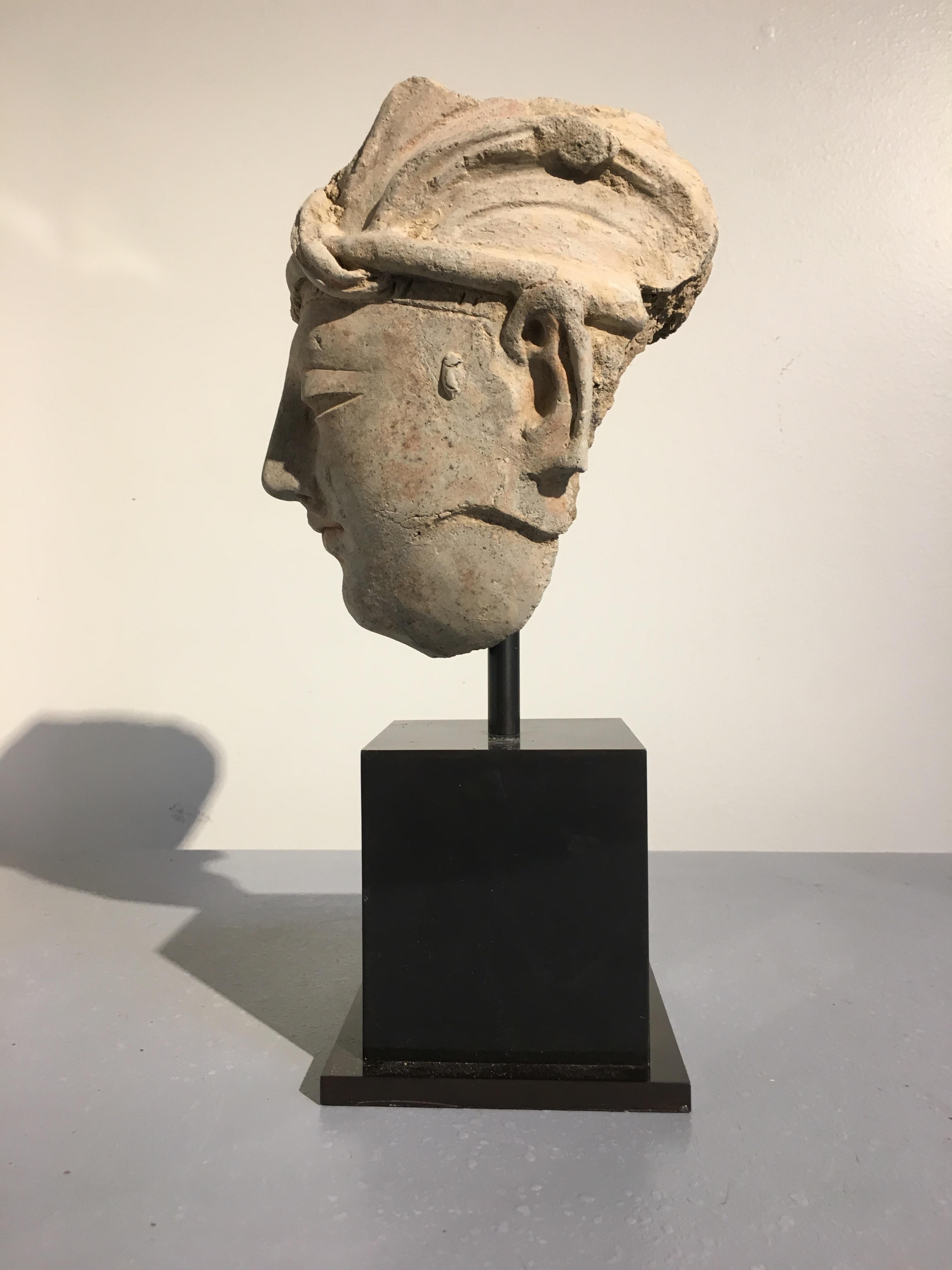 Hand-Crafted Gandharan Stucco Head of a Donor, 4th-5th Century For Sale