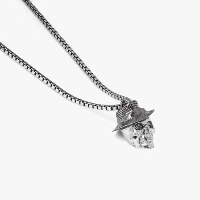 Gangster Skull Necklace in Stainless Steel

Celebrate the return of the twenties in style with the gangster skull pendant. This revamped version of the classic skull features a tilted black enamelled fedora, reminiscent of the original 20's