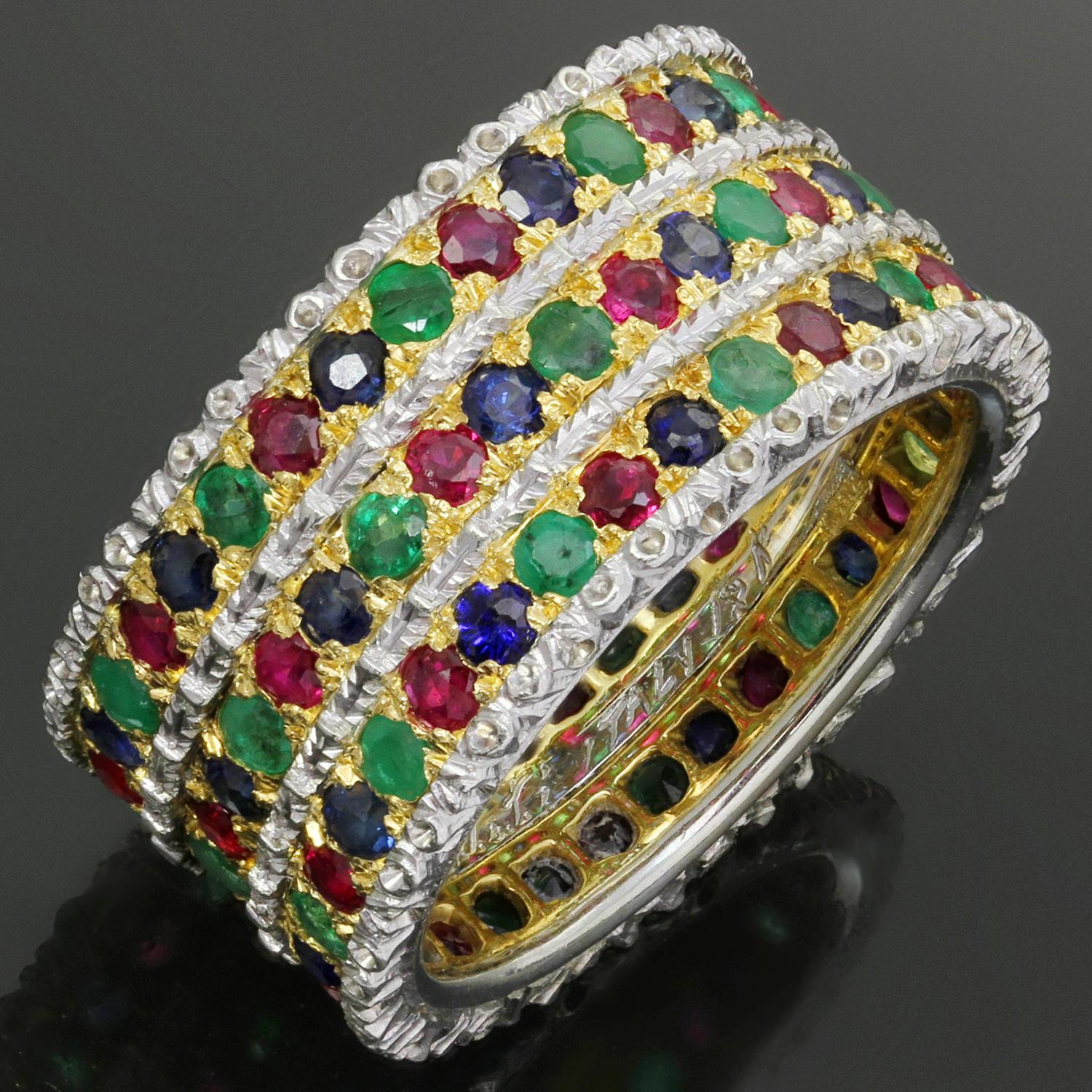 This gorgeous Ganmario Buccellati wide eternity band is crafted in 18k white & yellow gold and features 3 colorful rows set with old-mine cut round red rubies and blue and green sapphires. Made in Italy circa 1980s. Measurements: 0.38