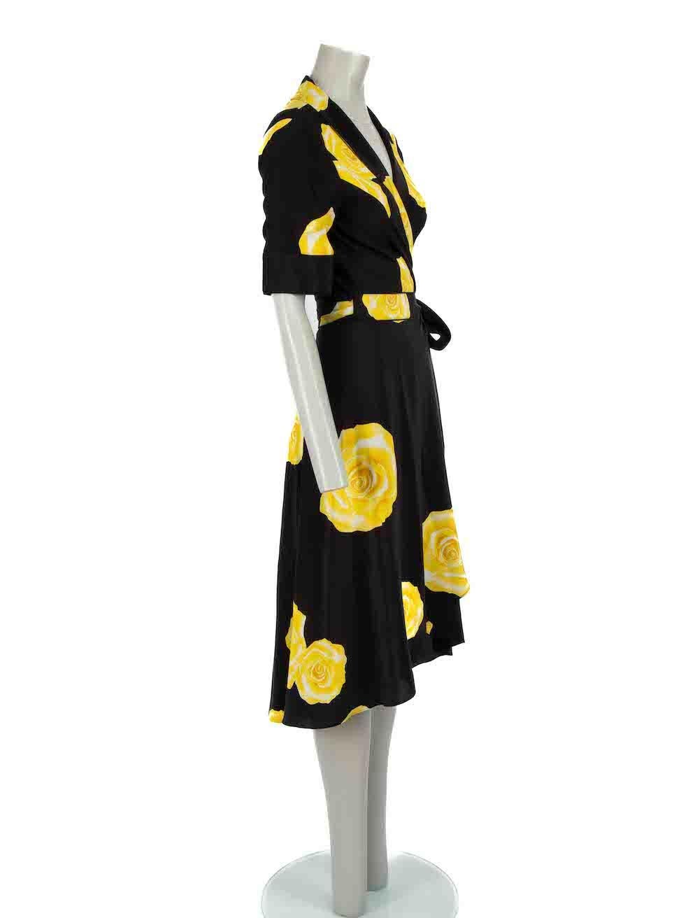 CONDITION is Very good. Hardly any visible wear to dress is evident on this used Ganni designer resale item.
 
 Details
 Fayette
 Black
 Silk
 Wrap dress
 Yellow rose print
 Midi
 V-neck
 Short sleeves
 
 
 Made in China
 
 Composition
 100% Silk
 
