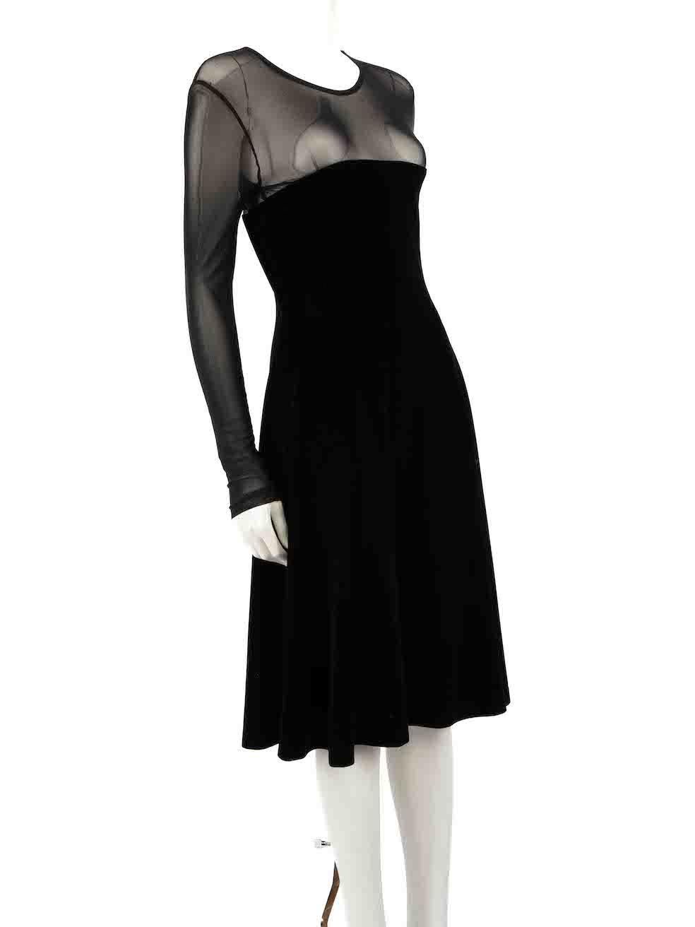 CONDITION is Very good. Minimal wear to dress is evident. Minimal wear to shoulder seams where the elastic fibres have broken. There is no size, care or composition label on this used Ganni designer resale item.
 
 
 
 Details
 
 
 Black
 
 Velvet
