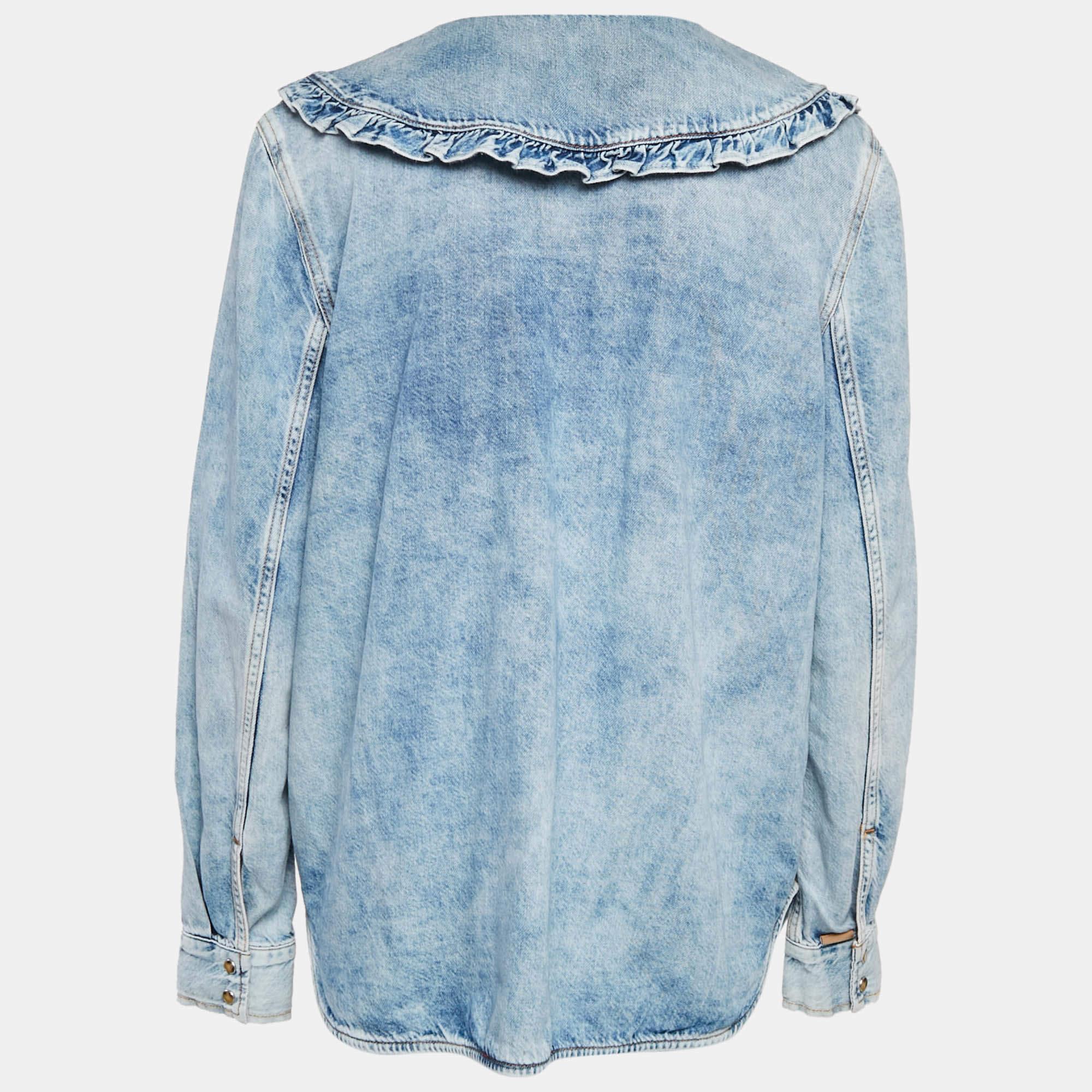Shirts are an indispensable part of a wardrobe  so Ganni brings you a creation that is both versatile and stylish. It has been tailored from quality material in a versatile shade and flaunts ruffled collar. The shirt is detailed with signature