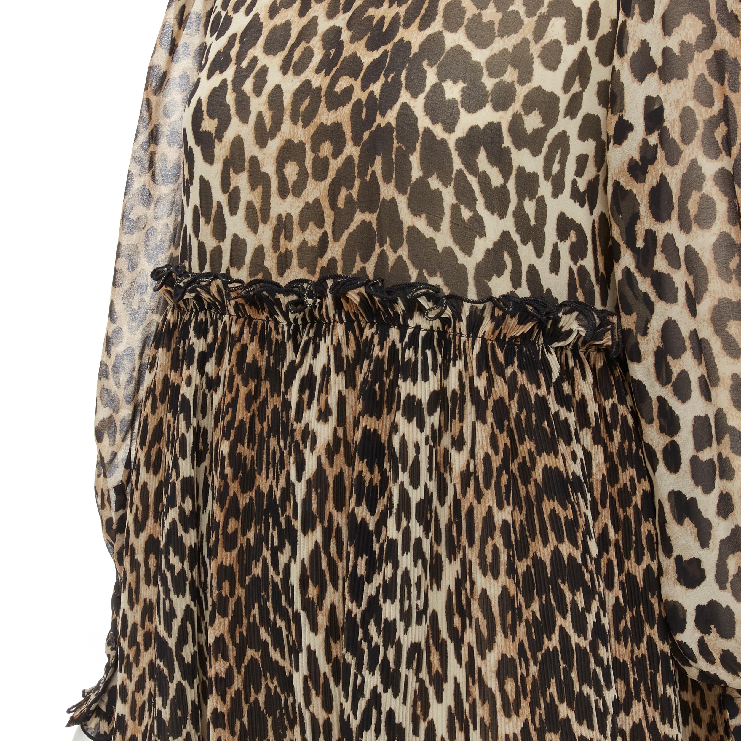 GANNI brown leopard spot print pleated flared babydoll dress FR36 S 
Reference: CECU/A00007 
Brand: Ganni 
Material: Polyester 
Color: Brown 
Pattern: Leopard 
Closure: Zip 
Made in: India 

CONDITION: 
Condition: Excellent, this item was pre-owned