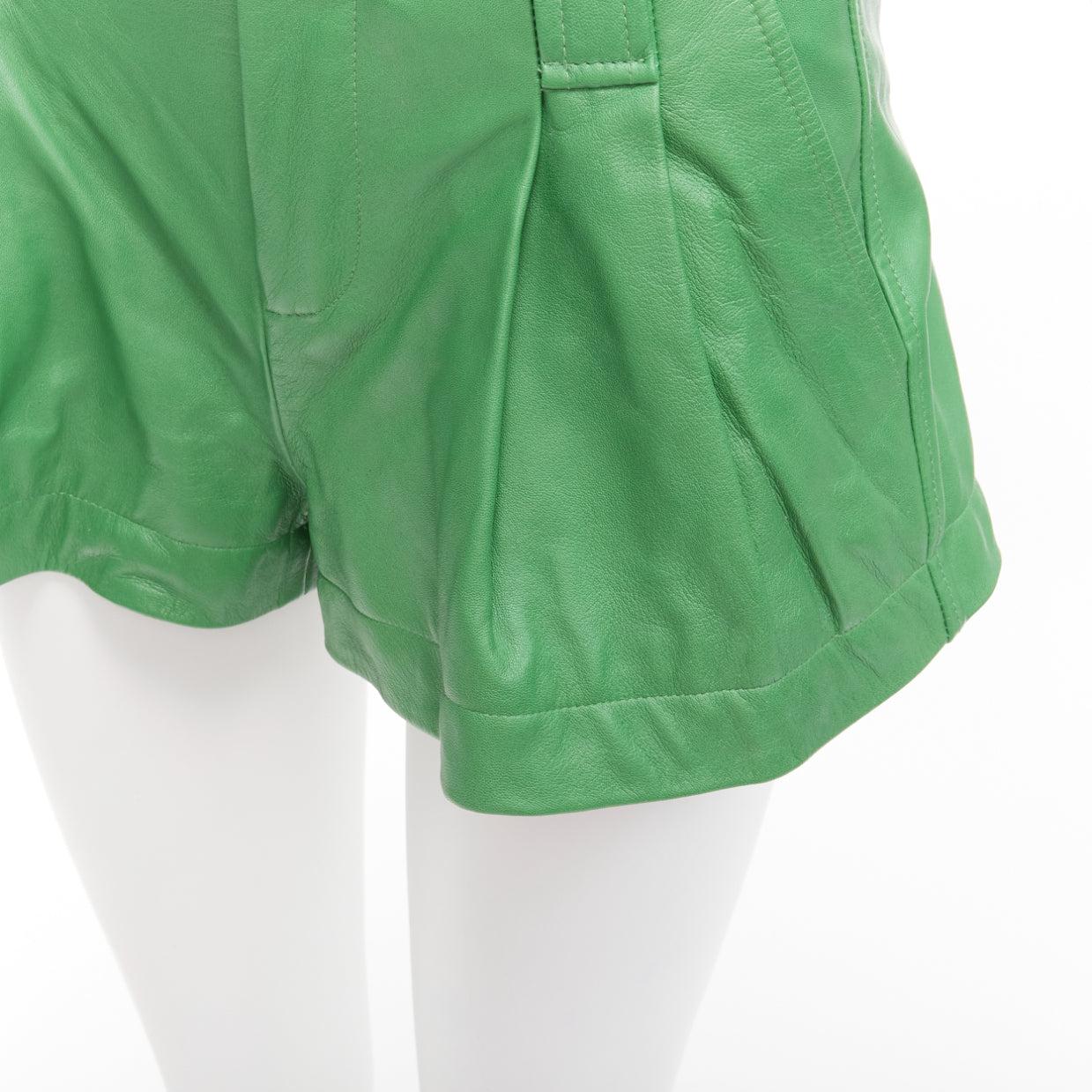GANNI green lambskin leather high waist flared shorts FR32 XXS
Reference: AAWC/A00869
Brand: Ganni
Material: Lambskin Leather
Color: Green
Pattern: Solid
Closure: Zip Fly
Lining: Black Fabric
Made in: India

CONDITION:
Condition: Very good, this
