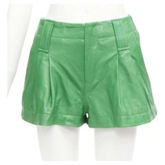 GANNI Grüne ausgestellte Shorts aus Lammfell und Leder mit hoher Taille FR32 XXS
