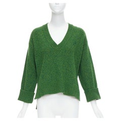 Ganni, maglione verde in misto lana riciclata con scollo a V XS