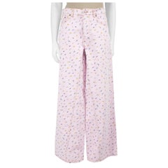 Ganni, jeans in denim rosa con motivo floreale, taglia M. I.