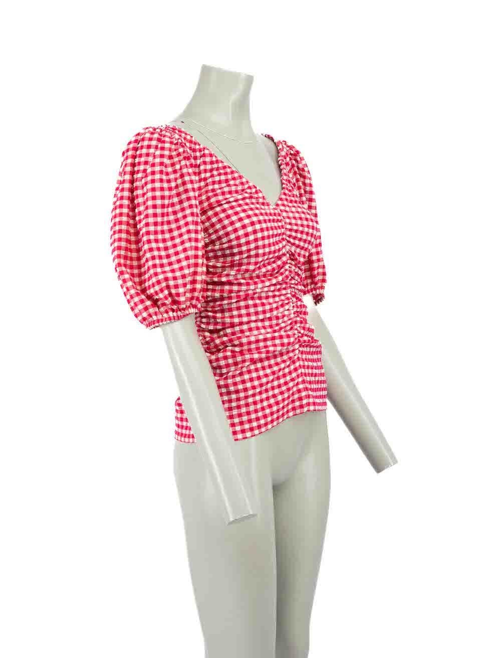 CONDITION is Never worn, with tags. No visible wear to top is evident on this new Ganni designer resale item.
 
 Details
 Love Potion model
 Red
 Polyester
 Puff sleeves top
 Gingham pattern
 Ruched accent
 V neckline
 Elasticated shoulder and