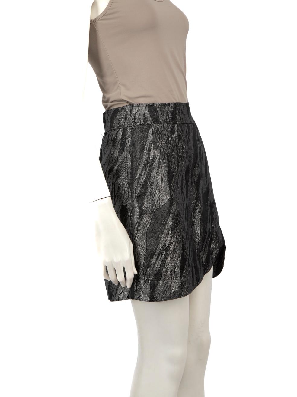 CONDITION is Very Good. Hardly any visible wear to the skirt is evident on this used Ganni designer resale item.
 
 Details
 
 
 Silver & black
 
 Polyester
 
 Skirt
 
 Mini
 
 A line
 
 Metallic tone
 
 Side zip fastening
 
 Curve detail on the