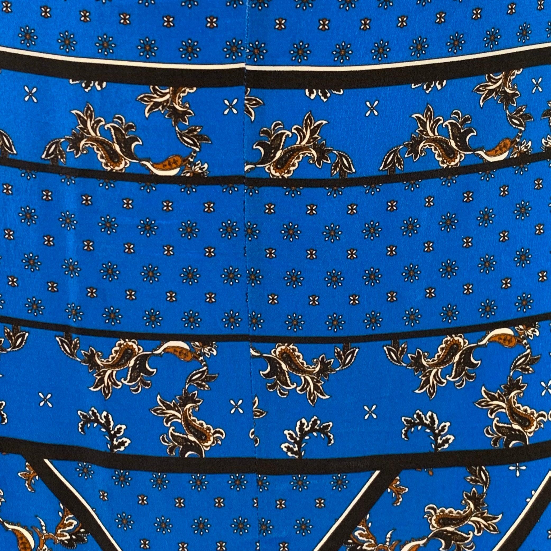 GANNI skirt
in a blue and black silk featuring a handkerchief pattern, asymmetrical hem, and back zipper closure. Very Good Pre-Owned Condition. Minor signs of wear. 

Marked:   IT 40 

Measurements: 
  Waist: 29 inches Hip: 38 inches Length: 28 -