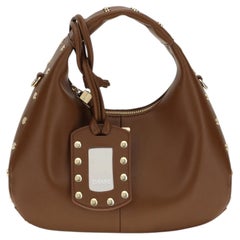 Borsa Hobo Ganni con borchie in pelle Lambtouch — Marrone