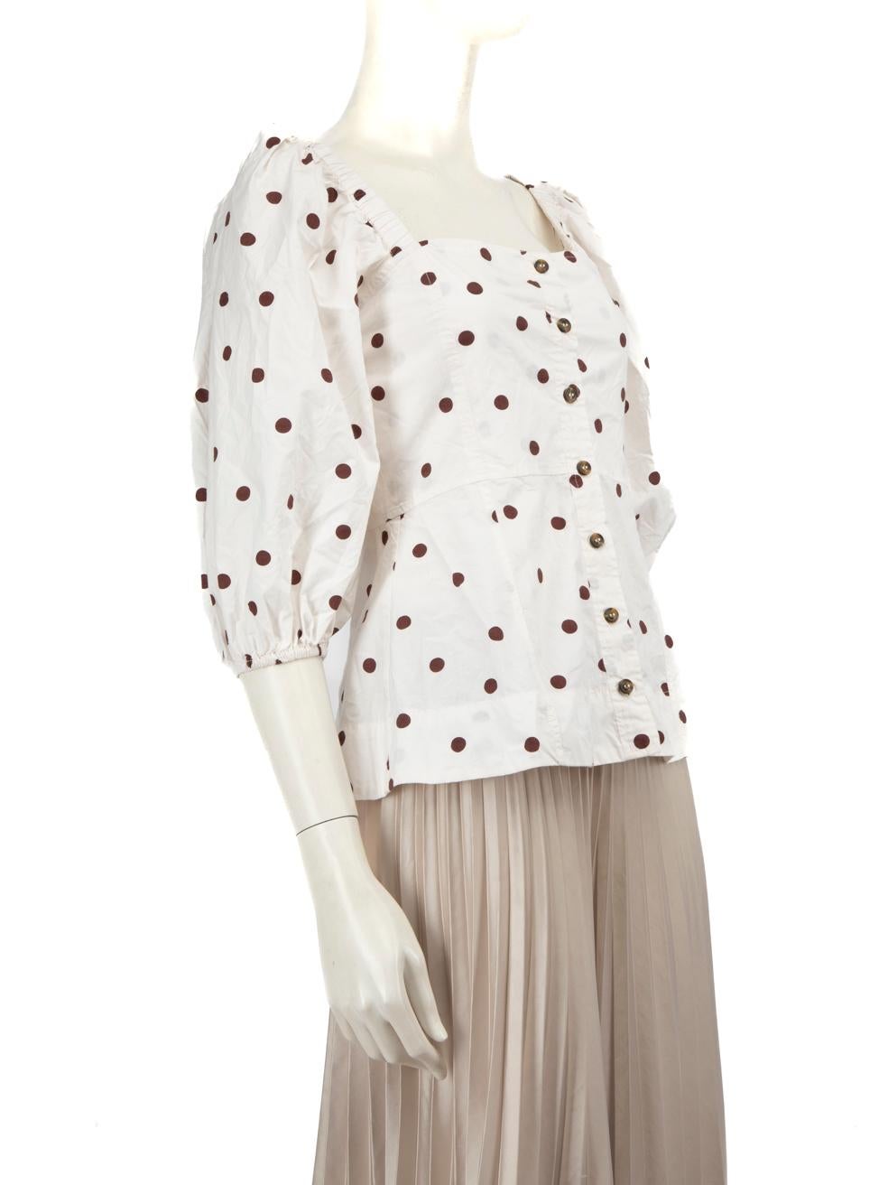 CONDITION is Very good. Minimal wear to the top is evident, there is a small mark on the front left sleeve and on the bottom of the button placket on this used Ganni designer resale item.
  
  Details
  
  
  White 
  
  Cotton 
  
  Top
  
 