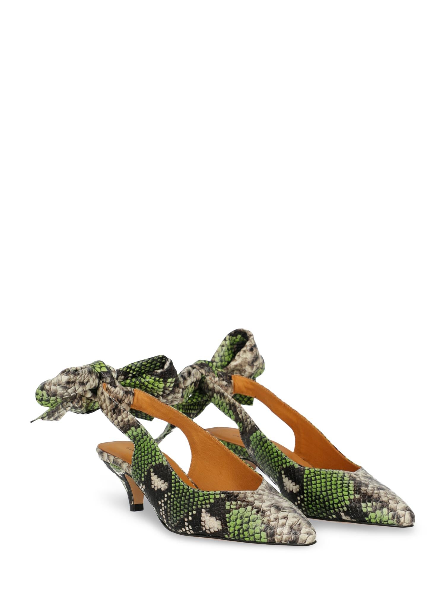 Mules, leather, snake print, shiny effect, backless design, slingback strap, pointed toe, branded insole, tapered heel, mid heel, leather lining, bow detail. Product Condition: Excellent. Insole: slightly visible stain
