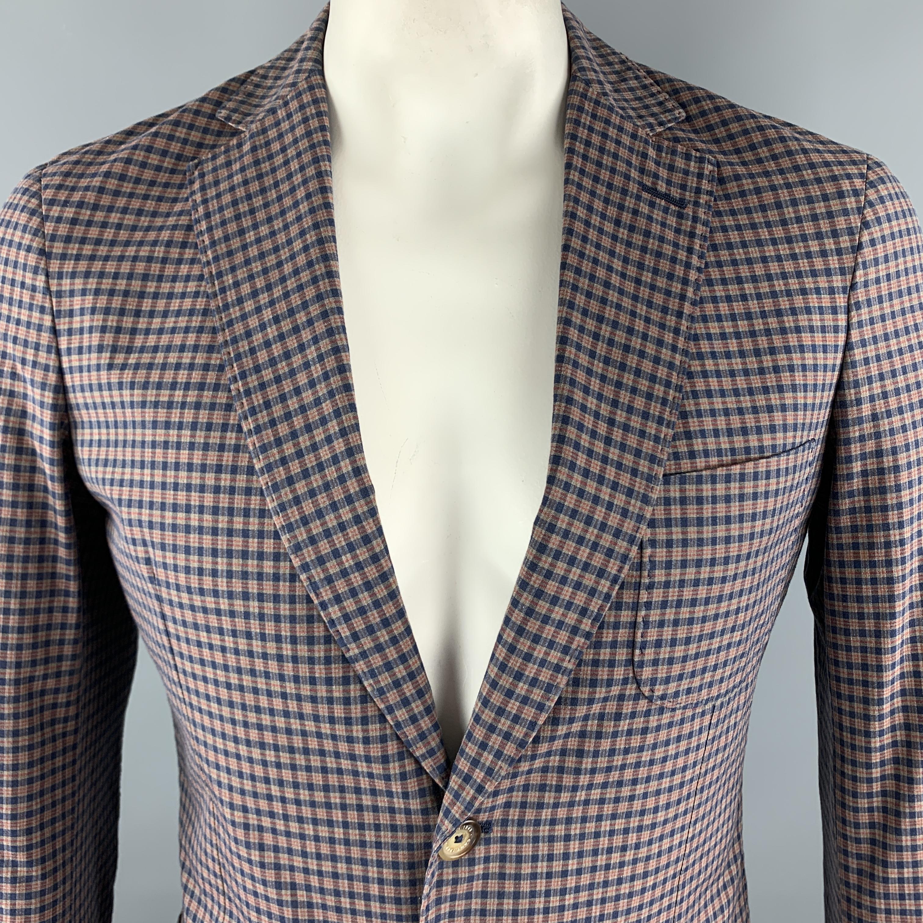 GANT by MICHAEL BASTIAN Sport Coat comes in navy and olive plaid cotton material, with a notch lapel, patch pockets, two buttons at closure, single breasted,elbow patches, functional buttons at cuffs and a double vent at back. Made in Portugal.