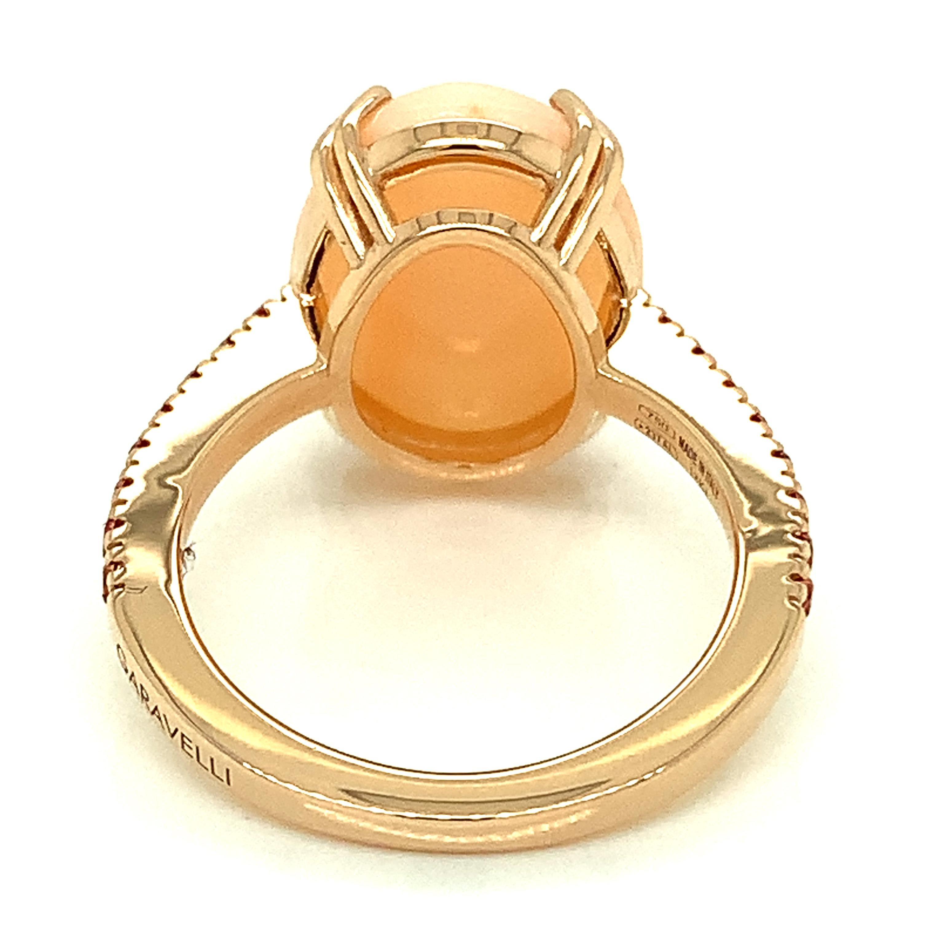 Garavelli 18 Karat Pink Gold Pink Opal and Orange Sapphires Coktail Ring.  Ring SIZE 6,25 US 52,25 EU
The cabochon is 16 x 12 mm
18KT GOLD  :GR 4.60
Orange Sapphires ct 0.35
Pink opal ct 6.16
Made in Valenza,  Italy