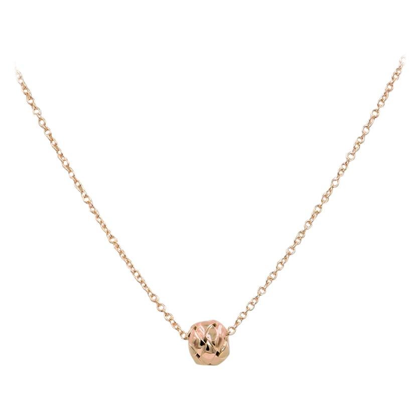 Garavelli  18 Karat Rose Gold Dedalo Pendant 
The pendant is rolling around the chain and featuring a nice interwined design; pendant size mm 8  
Chain lenght cm 45 with a loop at 40 cm
18kt GOLD  : gr 7.40.    Made in Italy
Available also in yellow
