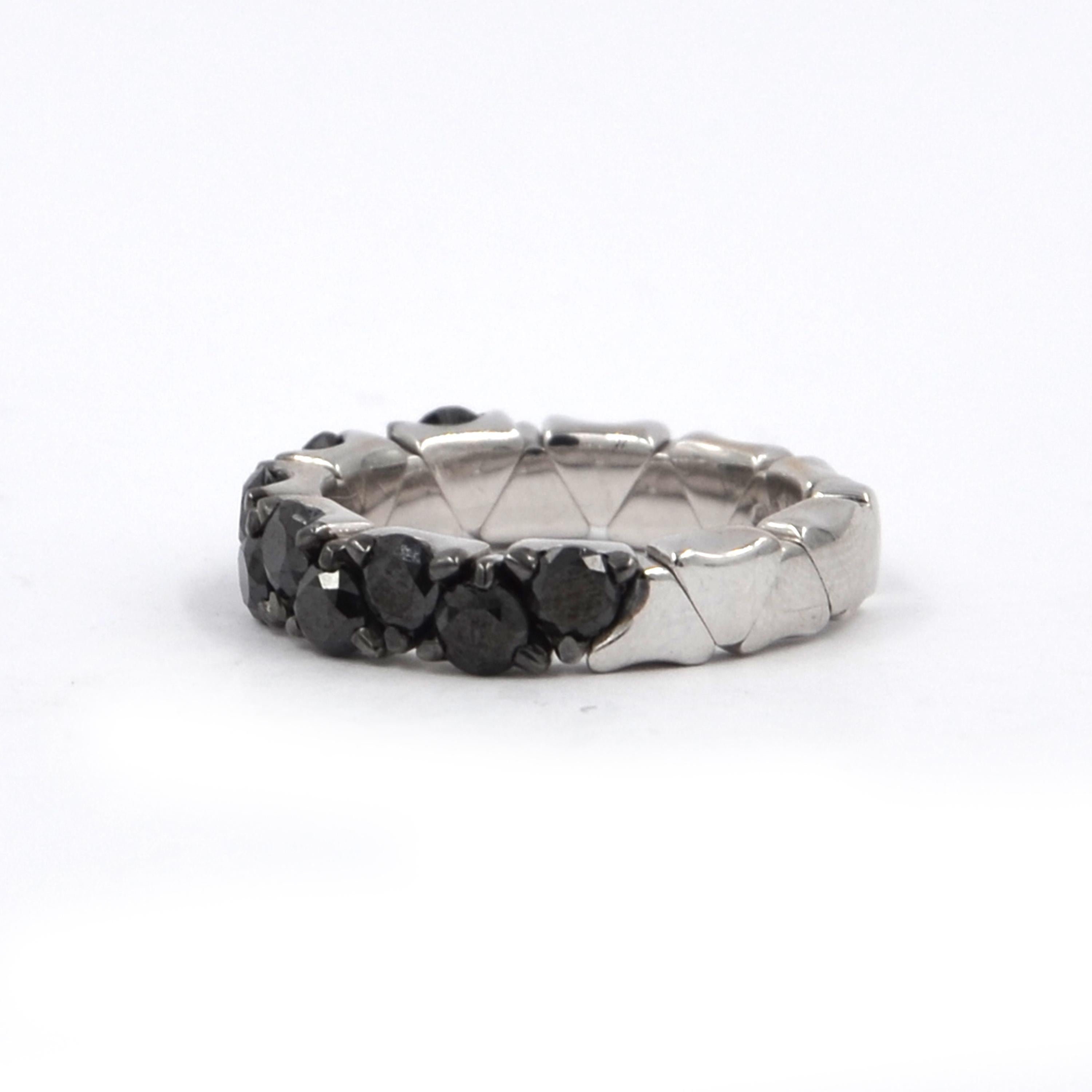 18KT White Gold Black Diamonds COIL GARAVELLI RING
For the first time on First Dib the famous Coil Garavelli Collection, one row new white gold ring with black diamonds.  
Coil inside in 18kt gold that makes the ring well suitable for a problematic