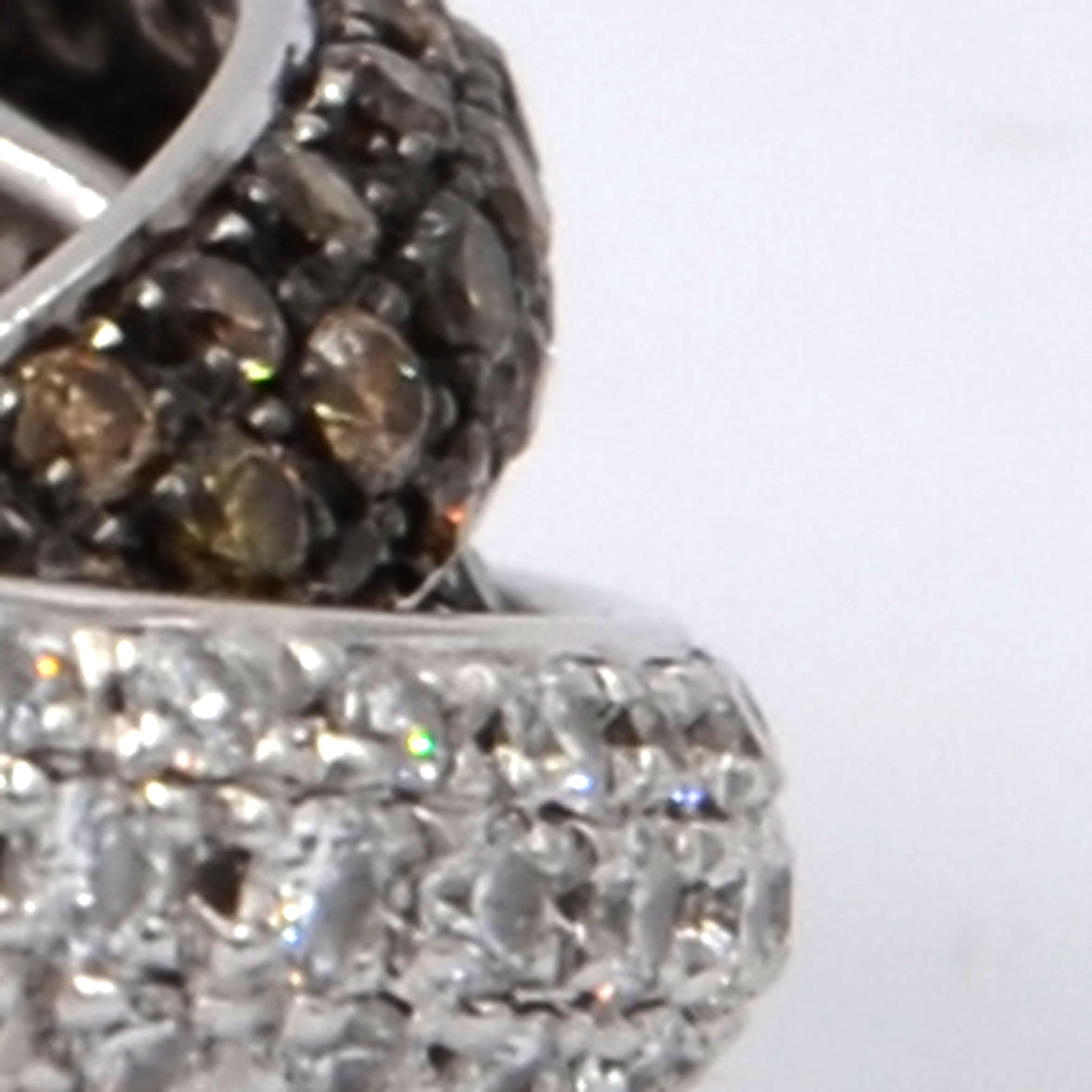 Garavelli 18 Karat White Gold White Black Brown Diamond Triband Pavè Rolling Ring
Ring size 55+
18KT GOLD  :GR 15.80
WHITE DIAMOND ct :1.69
BROWN DIAMONDS ct : 1.77
BLACK DIAMONDS ct : 1.80
Made in Italy