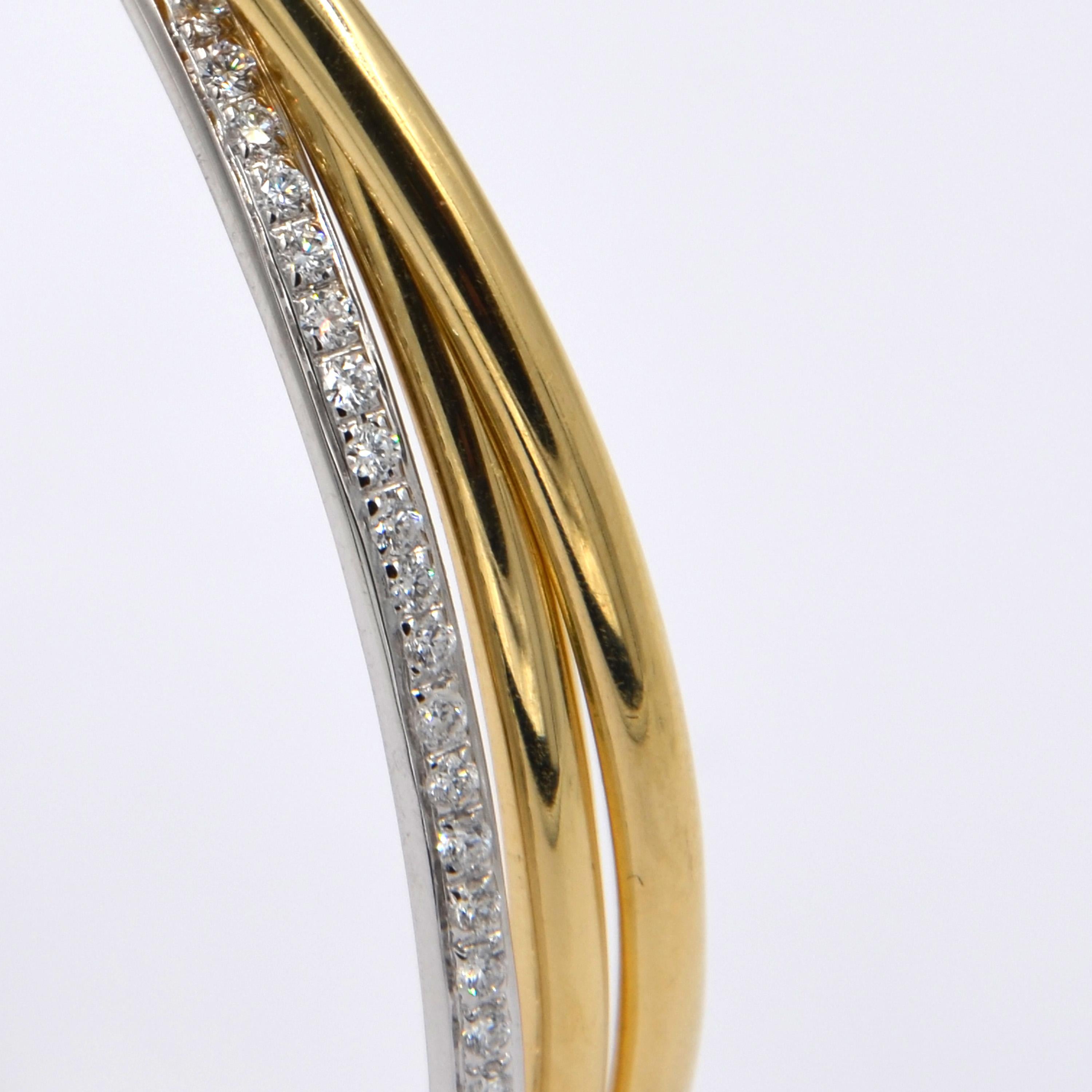 Garavelli 18 Karat Yellow and White Gold White Diamonds Rolling Bangle Bracelet In New Condition In Valenza, IT