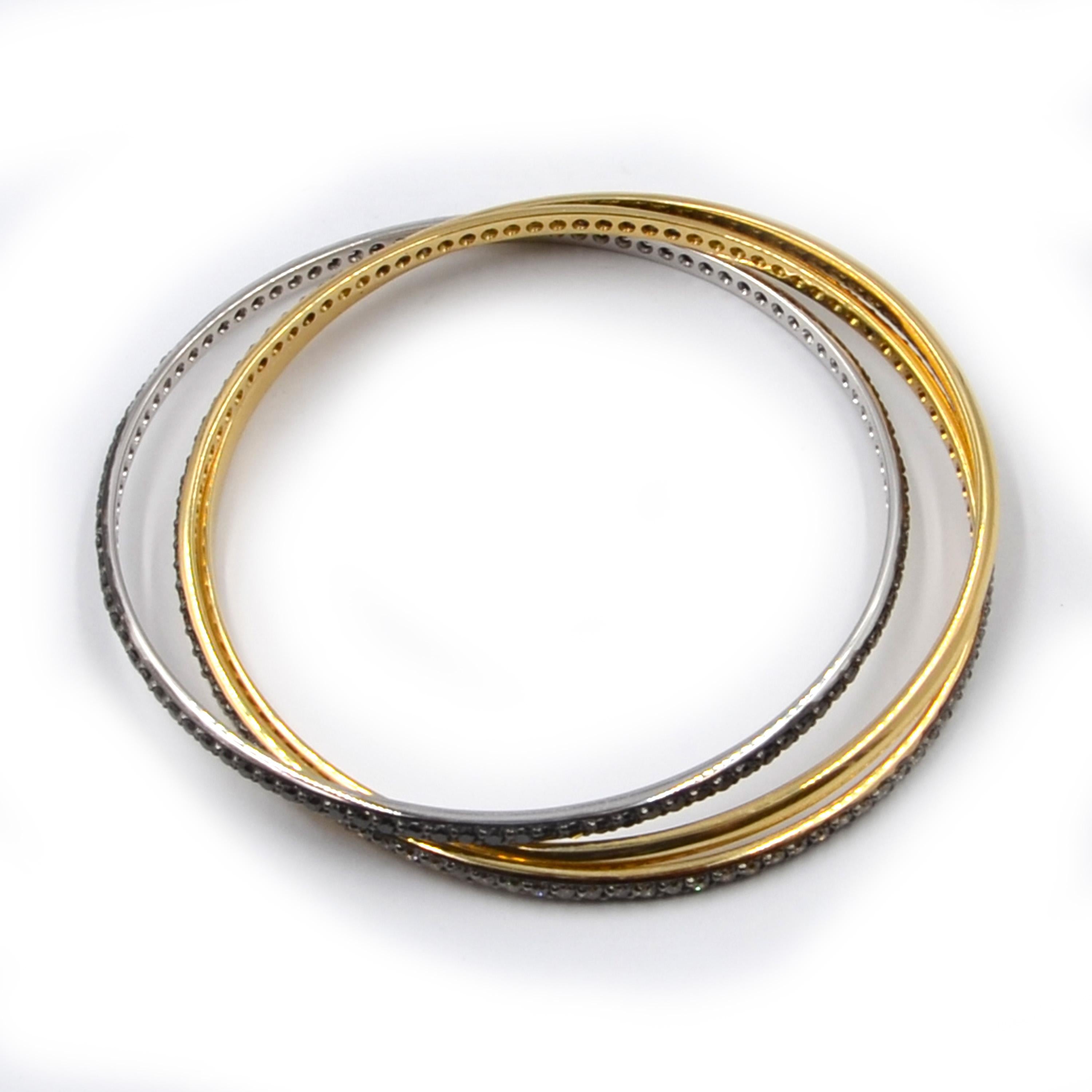 Garavelli Rolling-Armreif aus 18 Karat Gelbgold mit schwarzen und braunen Diamanten (Rundschliff) im Angebot