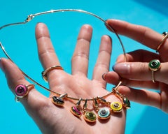 Garavelli Ciondolo Charm Giotto in oro giallo 18 carati con smalto fucsia e rodolite