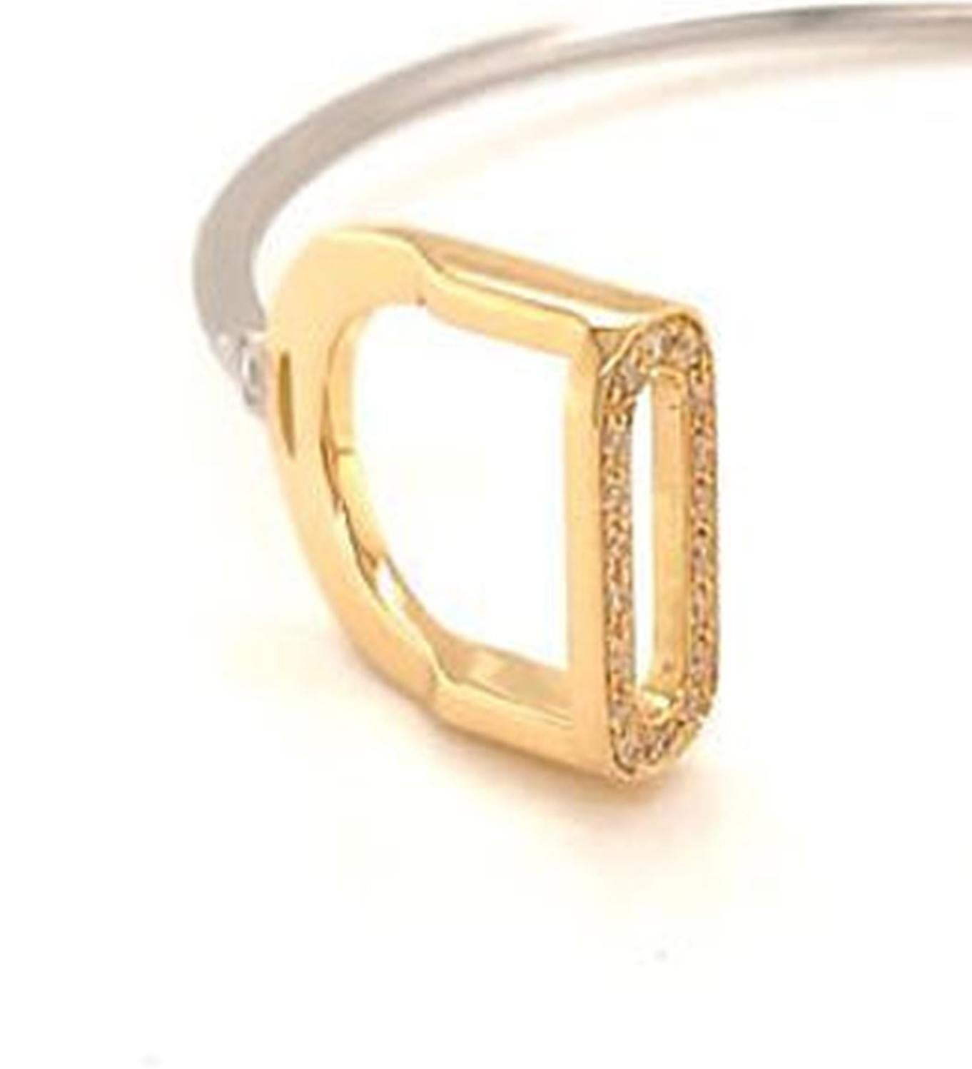 Garavelli 18 Karat Yellow and  White Gold  Bangle Bracelet from Staffe Collection, featuring white diamonds accent. Made in Valenza, Italy
Each Stirrup is 20 mm tall and  has one Diamond.
Bracelet size cm 17 or 6