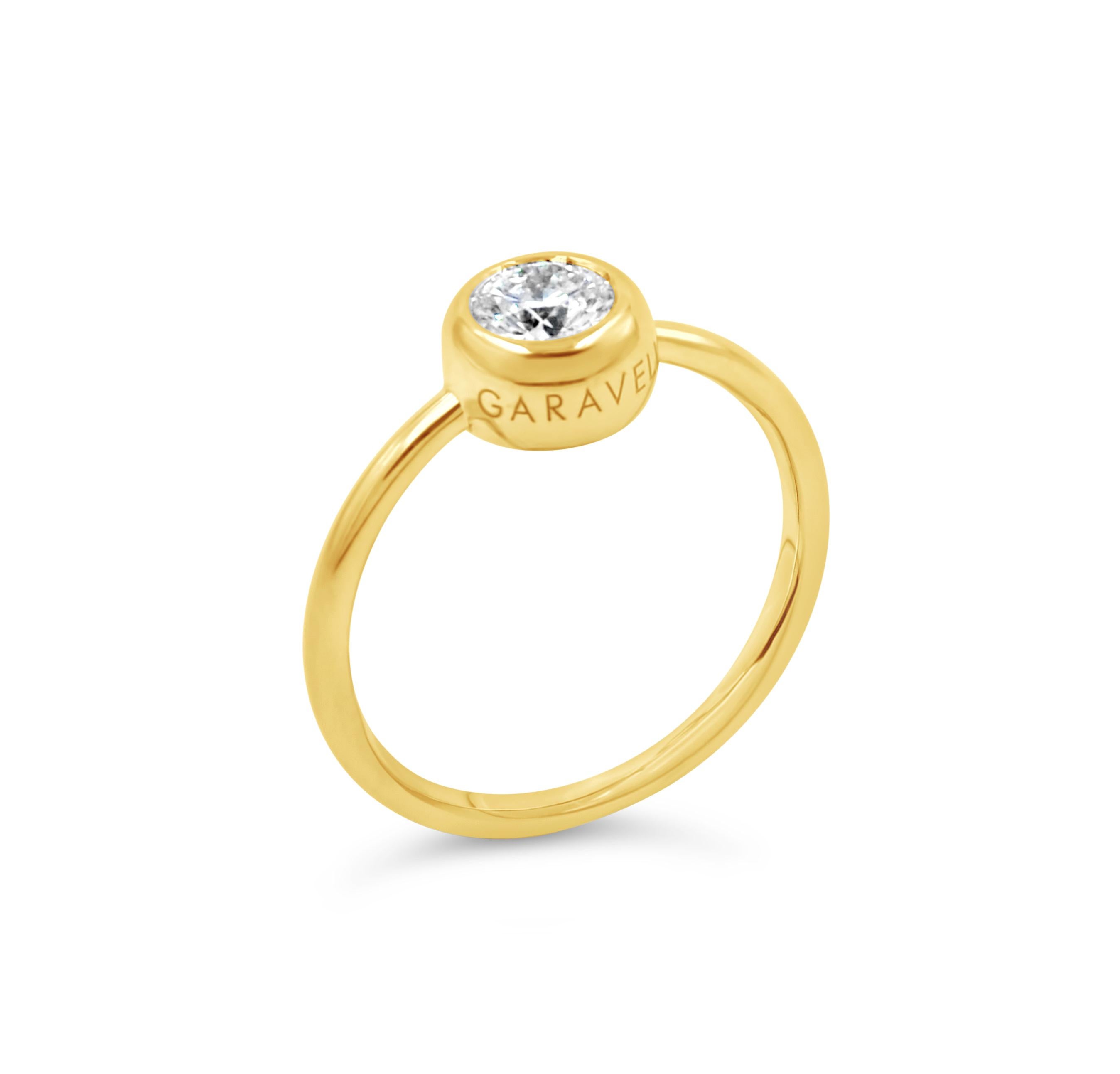Garavelli Anillo Giotto de Oro Amarillo de 18 Quilates con un Diamante Natural Blanco de 0,50 ct