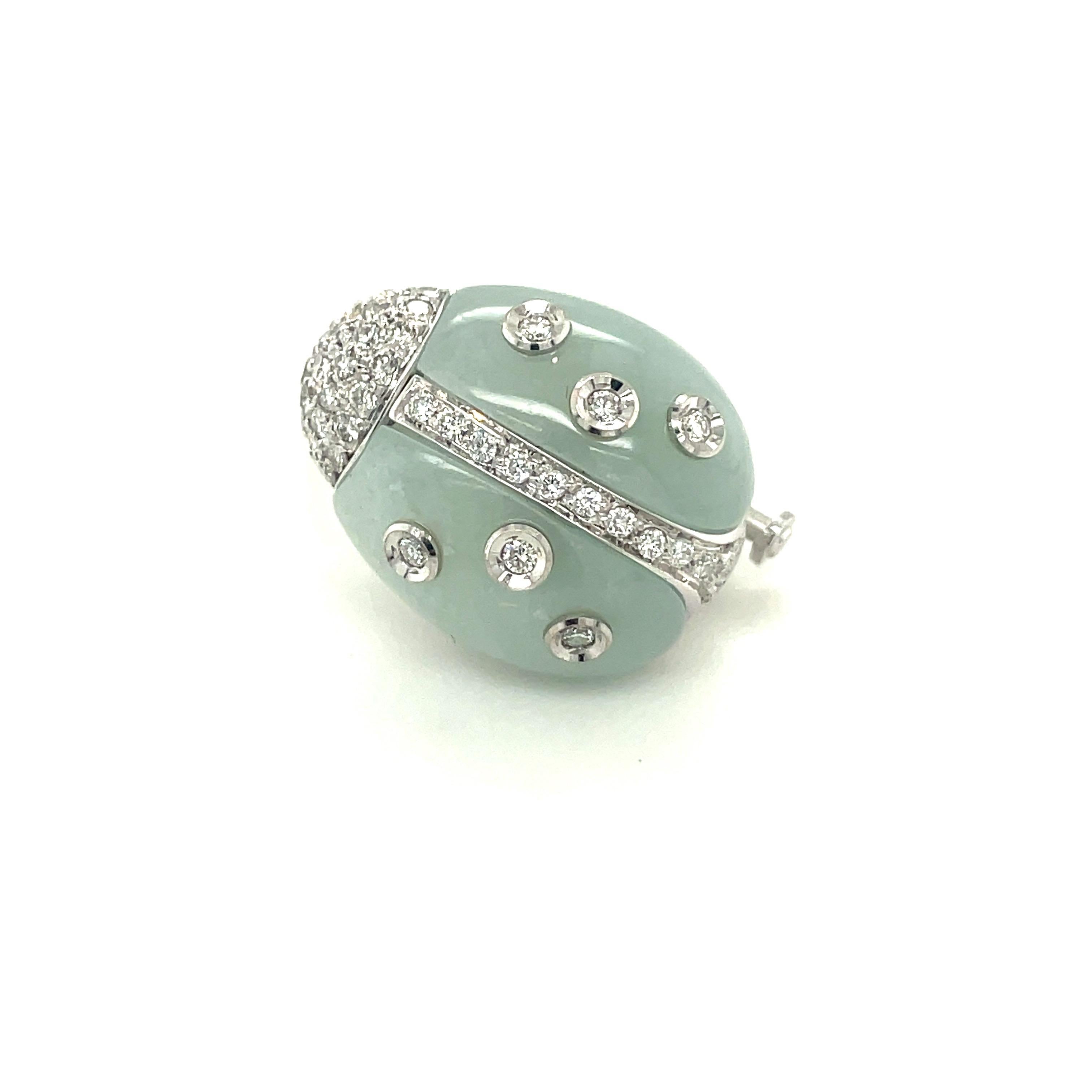 Lovely 18 karat ladybug brooch. The brooch is designed with polished aquamarine stones , accented with round brilliant diamonds set in white gold. The brooch measures 19mm.
Total diamond weight 0.33 carats
Signed Italy 18k 750