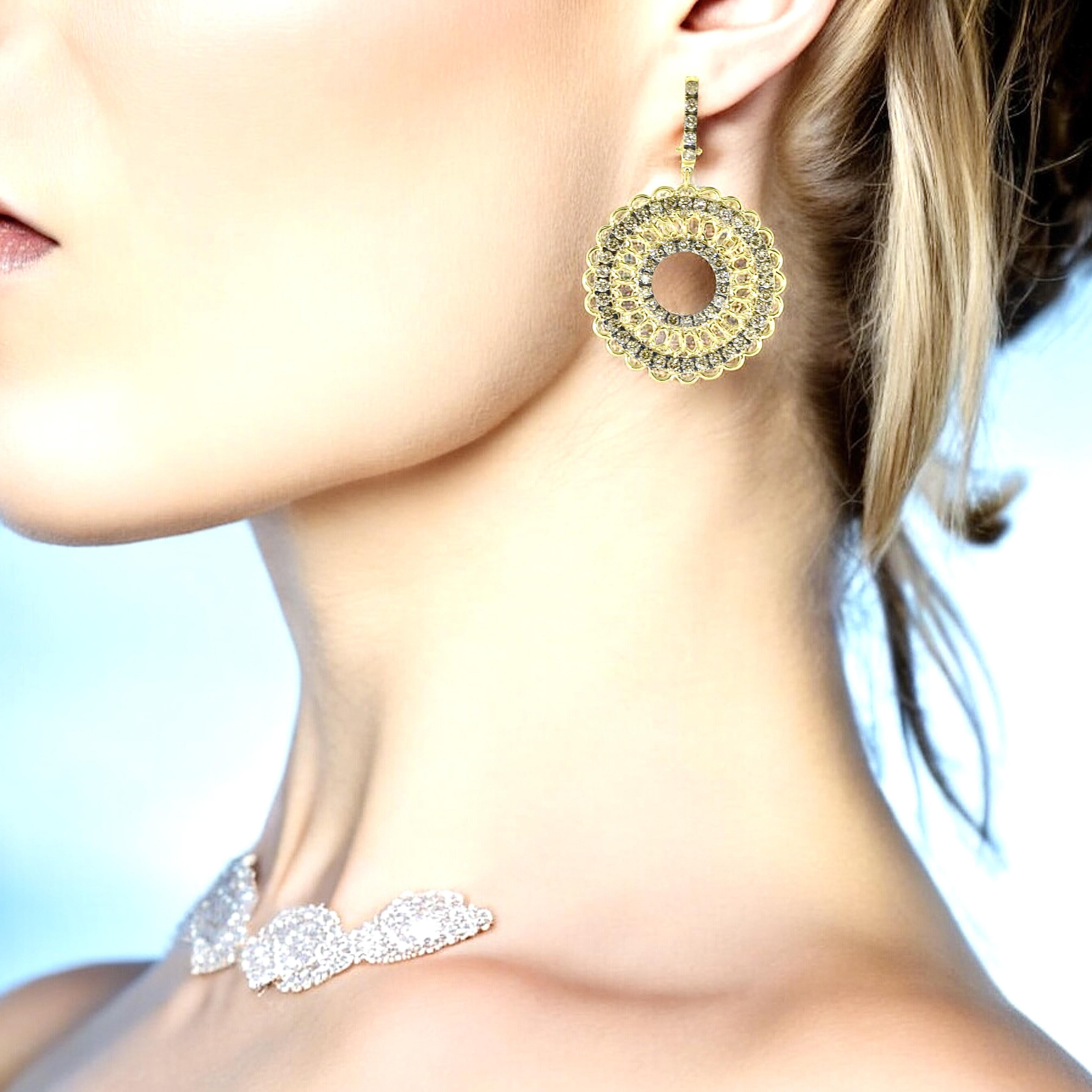 Garavelli Rinascimento a major European jewelry designer, these earrings are from their renaissance collection, and hand crafted in in both yellow and white gold.  They are 1.75 inches long, and possessing 118 brilliant cut diamonds.  The diamonds